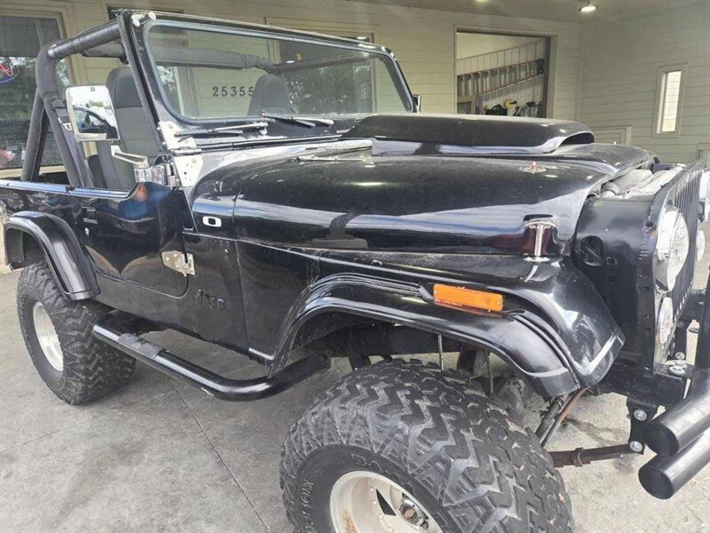 1984 Black Jeep CJ-7 2dr (1JCCM87E2ET) with an 4.2L I6 OHV 12V 2 BBL Engine engine, 4 Speed Manual transmission, located at 25355 Eames Street, Channahon, IL, 60410, (815) 467-1807, 41.429108, -88.228432 - ** V-8 MOTOR, JEEP COMMANDER FRAME, STARTS, RUNS, DRIVES, DOES NOT STEER DUE TO BENT STEERING COMPONENT. ** This 1984 Jeep CJ-7 2dr comes equipped with a robust 4.2L I6 OHV 12V 2 BBL Engine, offering reliable performance for any adventure. With remarkably low mileage, averaging less than 1,000 miles - Photo#3