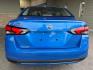 2021 Electric Blue Metallic Nissan Versa 1.6 S (3N1CN8BV4ML) with an 1.6L I4 122hp 114ft. lbs. engine, 5 Speed Manual transmission, located at 25355 Eames Street, Channahon, IL, 60410, (815) 467-1807, 41.429108, -88.228432 - Check out this sassy 2021 Nissan Versa S in Electric Blue Metallic with a Charcoal interior - talk about making a statement on the road! Powered by a zippy 1.6L I4 engine pushing out 122hp and 114ft. lbs. of torque, this compact beast is perfect for city cruising and highway adventures. With less t - Photo#4