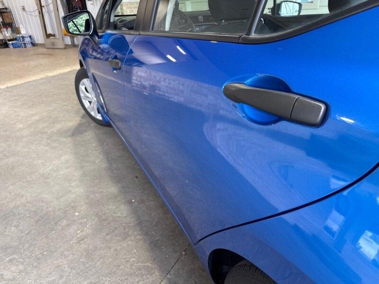 2021 Electric Blue Metallic Nissan Versa 1.6 S (3N1CN8BV4ML) with an 1.6L I4 122hp 114ft. lbs. engine, 5 Speed Manual transmission, located at 25355 Eames Street, Channahon, IL, 60410, (815) 467-1807, 41.429108, -88.228432 - Check out this sassy 2021 Nissan Versa S in Electric Blue Metallic with a Charcoal interior - talk about making a statement on the road! Powered by a zippy 1.6L I4 engine pushing out 122hp and 114ft. lbs. of torque, this compact beast is perfect for city cruising and highway adventures. With less t - Photo#9