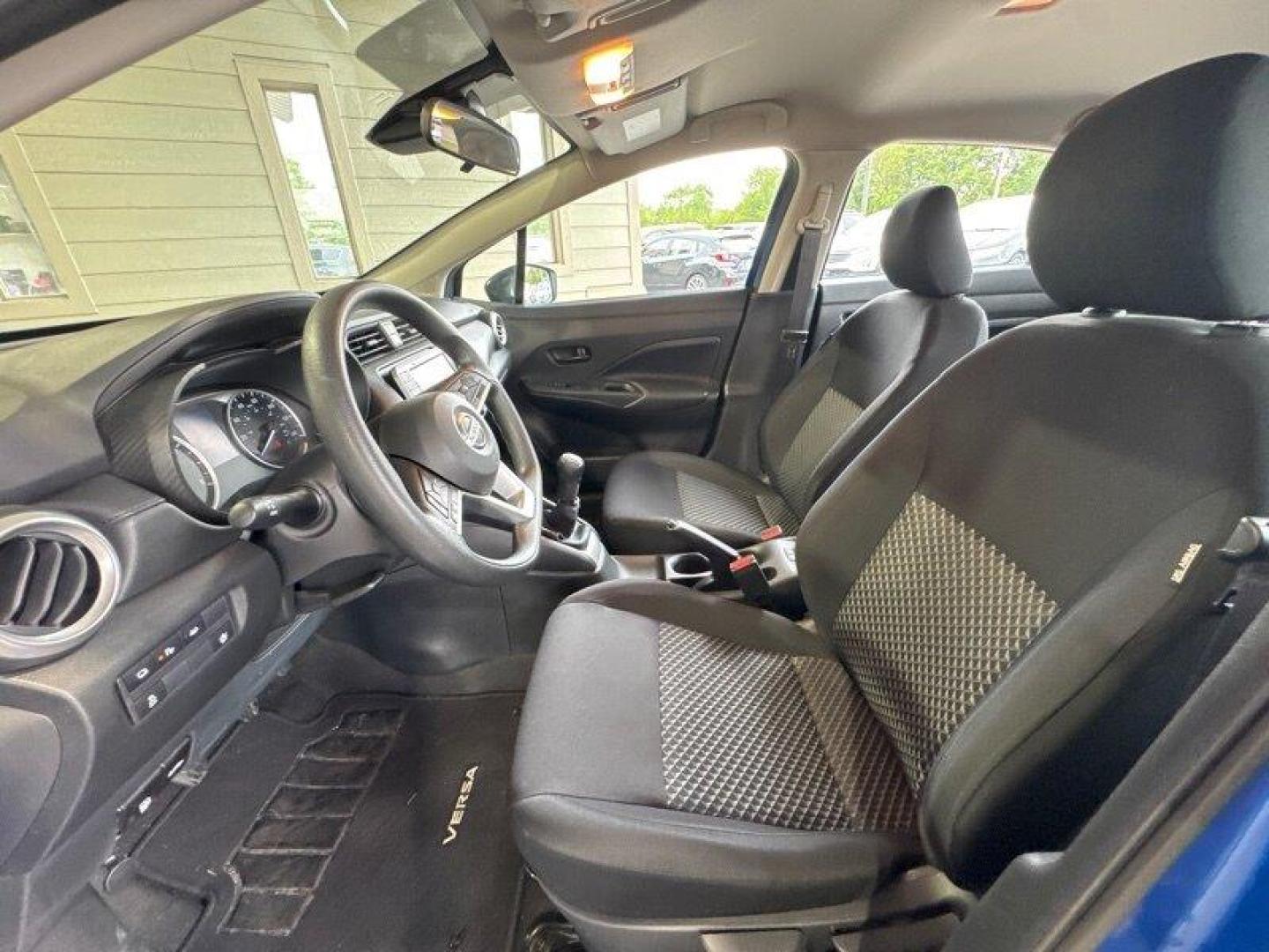 2021 Electric Blue Metallic Nissan Versa 1.6 S (3N1CN8BV4ML) with an 1.6L I4 122hp 114ft. lbs. engine, 5 Speed Manual transmission, located at 25355 Eames Street, Channahon, IL, 60410, (815) 467-1807, 41.429108, -88.228432 - Check out this sassy 2021 Nissan Versa S in Electric Blue Metallic with a Charcoal interior - talk about making a statement on the road! Powered by a zippy 1.6L I4 engine pushing out 122hp and 114ft. lbs. of torque, this compact beast is perfect for city cruising and highway adventures. With less t - Photo#13
