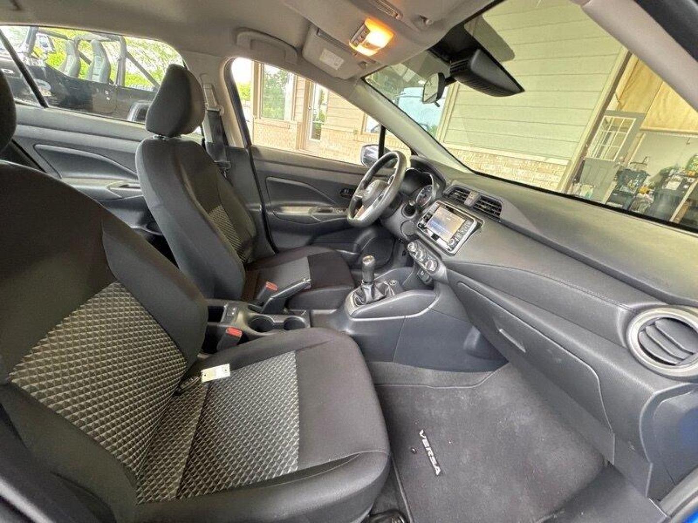 2021 Electric Blue Metallic Nissan Versa 1.6 S (3N1CN8BV4ML) with an 1.6L I4 122hp 114ft. lbs. engine, 5 Speed Manual transmission, located at 25355 Eames Street, Channahon, IL, 60410, (815) 467-1807, 41.429108, -88.228432 - Check out this sassy 2021 Nissan Versa S in Electric Blue Metallic with a Charcoal interior - talk about making a statement on the road! Powered by a zippy 1.6L I4 engine pushing out 122hp and 114ft. lbs. of torque, this compact beast is perfect for city cruising and highway adventures. With less t - Photo#16