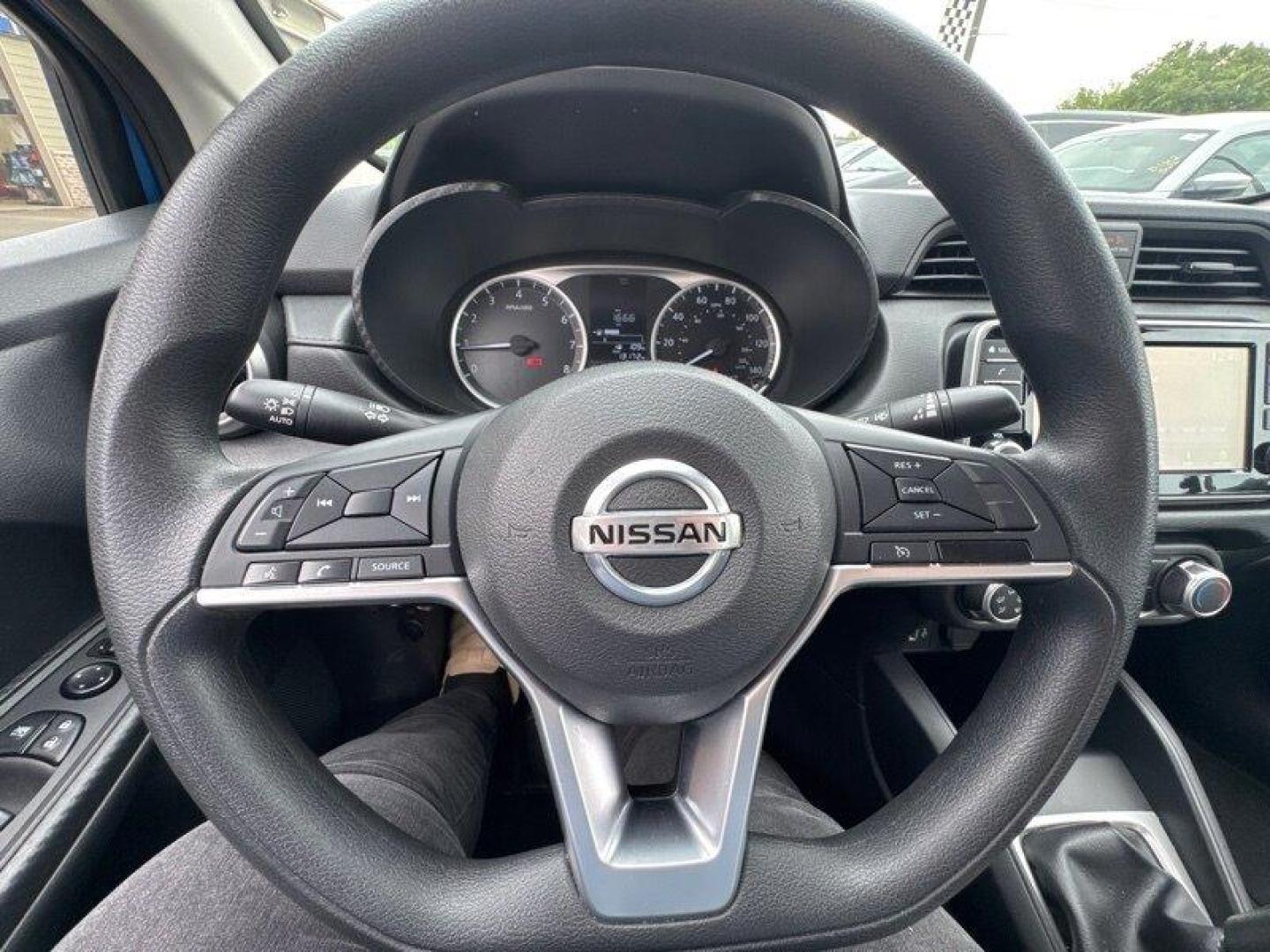 2021 Electric Blue Metallic Nissan Versa 1.6 S (3N1CN8BV4ML) with an 1.6L I4 122hp 114ft. lbs. engine, 5 Speed Manual transmission, located at 25355 Eames Street, Channahon, IL, 60410, (815) 467-1807, 41.429108, -88.228432 - Check out this sassy 2021 Nissan Versa S in Electric Blue Metallic with a Charcoal interior - talk about making a statement on the road! Powered by a zippy 1.6L I4 engine pushing out 122hp and 114ft. lbs. of torque, this compact beast is perfect for city cruising and highway adventures. With less t - Photo#25