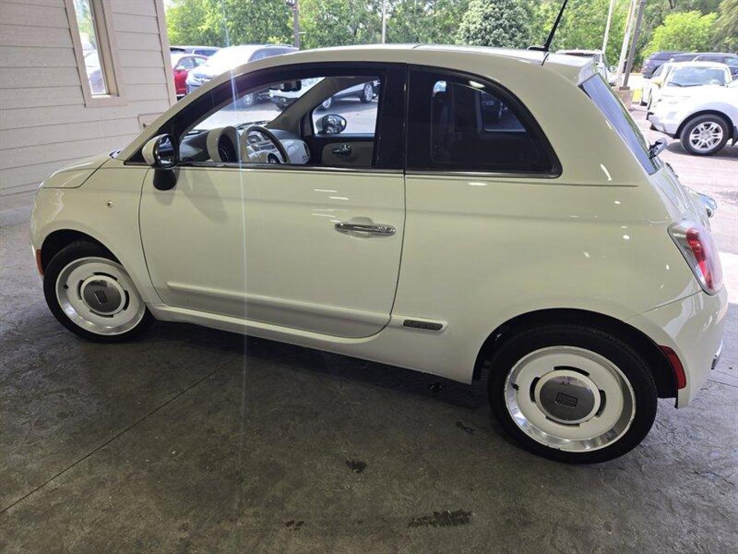 2015 Bianco FIAT 500 Lounge (3C3CFFCR0FT) with an 1.4L I4 101hp 98ft. lbs. engine, Automatic transmission, located at 25355 Eames Street, Channahon, IL, 60410, (815) 467-1807, 41.429108, -88.228432 - This 2015 FIAT 500 Lounge comes with a 1.4L I4 engine that delivers 101hp and 98ft. lbs. of torque. The exterior color is Bianco, complemented by a Black interior. With below 79,000 miles, averaging less than 8,000 miles per year, this FIAT offers impressive fuel efficiency, achieving 31 MPG in the - Photo#6