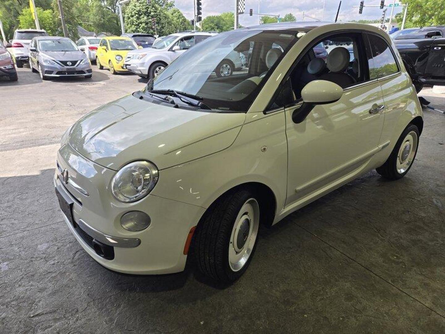 2015 Bianco FIAT 500 Lounge (3C3CFFCR0FT) with an 1.4L I4 101hp 98ft. lbs. engine, Automatic transmission, located at 25355 Eames Street, Channahon, IL, 60410, (815) 467-1807, 41.429108, -88.228432 - This 2015 FIAT 500 Lounge comes with a 1.4L I4 engine that delivers 101hp and 98ft. lbs. of torque. The exterior color is Bianco, complemented by a Black interior. With below 79,000 miles, averaging less than 8,000 miles per year, this FIAT offers impressive fuel efficiency, achieving 31 MPG in the - Photo#7