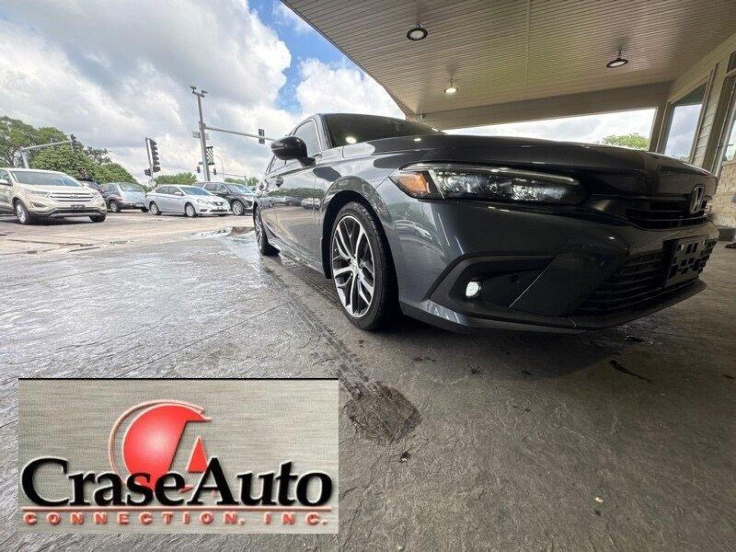 2024 Meteorite Gray Metallic Honda Civic Touring (2HGFE1F9XRH) with an 1.5L Turbo I4 180hp 177ft. lbs. engine, Automatic transmission, located at 25355 Eames Street, Channahon, IL, 60410, (815) 467-1807, 41.429108, -88.228432 - Introducing the 2024 Honda Civic Touring - a powerhouse on the road! This sleek sedan is equipped with a robust 1.5L Turbo I4 engine, delivering an impressive 180hp and 177ft. lbs. of torque for an exhilarating driving experience. Straight from the factory, this Civic Touring comes loaded with top- - Photo#0