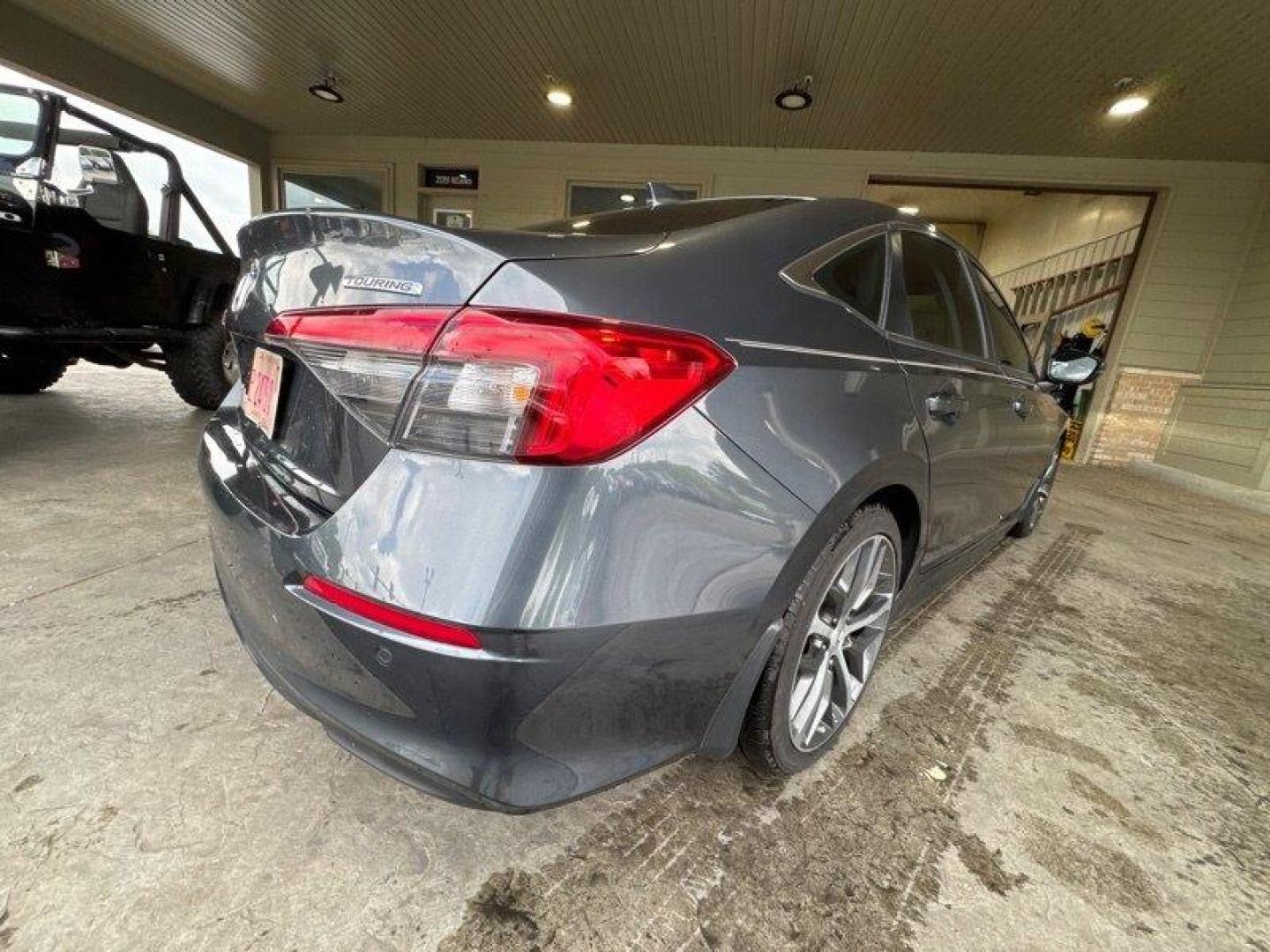 2024 Meteorite Gray Metallic Honda Civic Touring (2HGFE1F9XRH) with an 1.5L Turbo I4 180hp 177ft. lbs. engine, Automatic transmission, located at 25355 Eames Street, Channahon, IL, 60410, (815) 467-1807, 41.429108, -88.228432 - Introducing the 2024 Honda Civic Touring - a powerhouse on the road! This sleek sedan is equipped with a robust 1.5L Turbo I4 engine, delivering an impressive 180hp and 177ft. lbs. of torque for an exhilarating driving experience. Straight from the factory, this Civic Touring comes loaded with top- - Photo#3