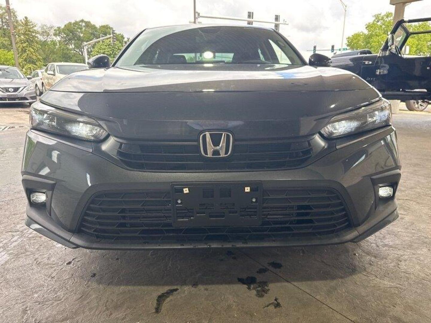 2024 Meteorite Gray Metallic Honda Civic Touring (2HGFE1F9XRH) with an 1.5L Turbo I4 180hp 177ft. lbs. engine, Automatic transmission, located at 25355 Eames Street, Channahon, IL, 60410, (815) 467-1807, 41.429108, -88.228432 - Introducing the 2024 Honda Civic Touring - a powerhouse on the road! This sleek sedan is equipped with a robust 1.5L Turbo I4 engine, delivering an impressive 180hp and 177ft. lbs. of torque for an exhilarating driving experience. Straight from the factory, this Civic Touring comes loaded with top- - Photo#8