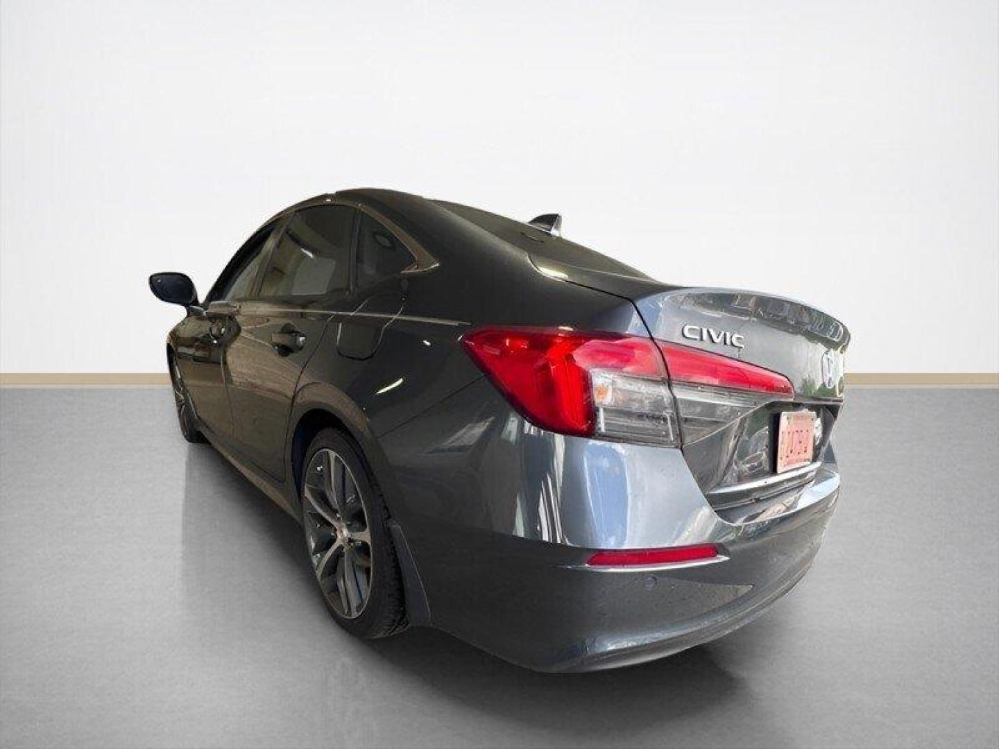2024 Meteorite Gray Metallic Honda Civic Touring (2HGFE1F9XRH) with an 1.5L Turbo I4 180hp 177ft. lbs. engine, Automatic transmission, located at 25355 Eames Street, Channahon, IL, 60410, (815) 467-1807, 41.429108, -88.228432 - Introducing the 2024 Honda Civic Touring - a powerhouse on the road! This sleek sedan is equipped with a robust 1.5L Turbo I4 engine, delivering an impressive 180hp and 177ft. lbs. of torque for an exhilarating driving experience. Straight from the factory, this Civic Touring comes loaded with top- - Photo#4