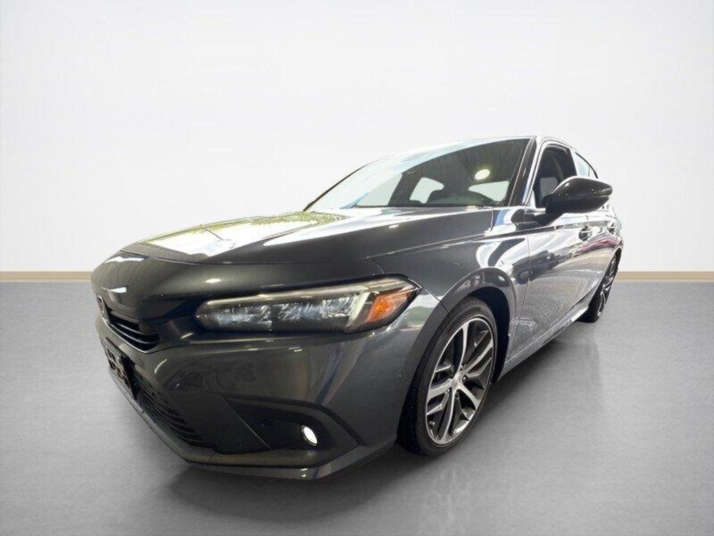 2024 Meteorite Gray Metallic Honda Civic Touring (2HGFE1F9XRH) with an 1.5L Turbo I4 180hp 177ft. lbs. engine, Automatic transmission, located at 25355 Eames Street, Channahon, IL, 60410, (815) 467-1807, 41.429108, -88.228432 - Introducing the 2024 Honda Civic Touring - a powerhouse on the road! This sleek sedan is equipped with a robust 1.5L Turbo I4 engine, delivering an impressive 180hp and 177ft. lbs. of torque for an exhilarating driving experience. Straight from the factory, this Civic Touring comes loaded with top- - Photo#6
