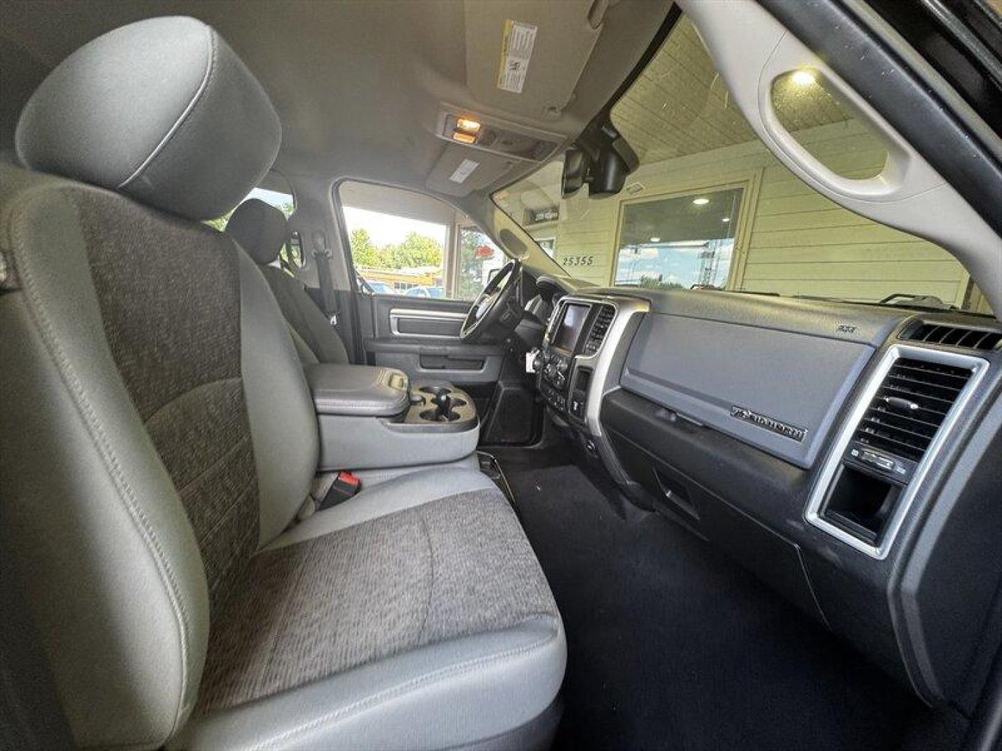 2018 Brilliant Black Crystal Pearl Coat RAM 1500 Big Horn (3C6RR7LT1JG) with an HEMI 5.7L V8 395hp 410ft. lbs. engine, Automatic transmission, located at 25355 Eames Street, Channahon, IL, 60410, (815) 467-1807, 41.429108, -88.228432 - Introducing the 2018 RAM 1500 SLT, a powerhouse of a truck that combines rugged capability with refined comfort. Under the hood, this beast is propelled by a HEMI 5.7L V8 engine, delivering an impressive 395 horsepower and 410 lb-ft of torque. Whether you're towing heavy loads or tackling tough terr - Photo#18