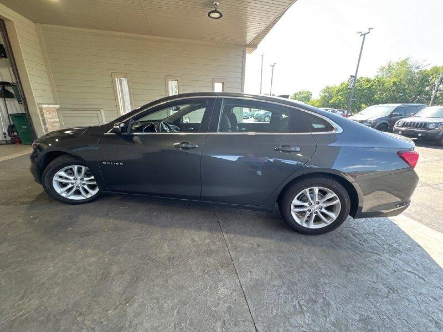 2017 Nightfall Gray Metallic Chevrolet Malibu LT 1LT (1G1ZE5ST0HF) with an Ecotec 1.5L Turbo I4 160hp 184ft. lbs. engine, Automatic transmission, located at 25355 Eames Street, Channahon, IL, 60410, (815) 467-1807, 41.429108, -88.228432 - Introducing the stylish and efficient 2017 Chevrolet Malibu LT in the captivating Nightfall Gray Metallic exterior paired with a sleek Jet Black interior! This beauty is powered by a robust Ecotec 1.5L Turbo I4 engine delivering a peppy 160hp and 184ft. lbs. of torque. With under 71,000 miles on the - Photo#6