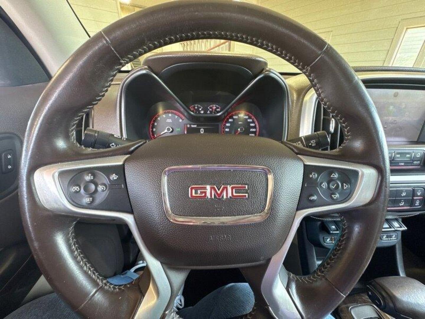 2015 Bronze Alloy Metallic GMC Canyon SLT (1GTH6CE35F1) with an 3.6L V6 305hp 269ft. lbs. engine, Automatic transmission, located at 25355 Eames Street, Channahon, IL, 60410, (815) 467-1807, 41.429108, -88.228432 - Get ready to experience the perfect blend of power and luxury with the 2015 GMC Canyon SLT! This impressive truck is equipped with a robust 3.6L V6 engine that delivers a thrilling 305hp and 269ft. lbs. of torque, ensuring a smooth and exhilarating ride every time you hit the road. The GMC Canyon S - Photo#25