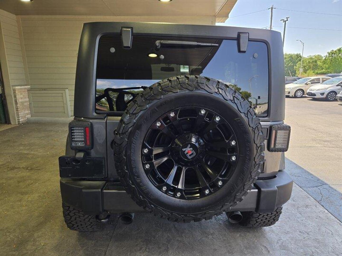 2016 Granite Crystal Metallic Clear Coat Jeep Wrangler Unlimited Sahara (1C4BJWEG3GL) with an 3.6L V6 285hp 260ft. lbs. engine, Automatic transmission, located at 25355 Eames Street, Channahon, IL, 60410, (815) 467-1807, 41.429108, -88.228432 - Introducing the 2016 Jeep Wrangler Unlimited Sahara, a rugged and versatile SUV ready to take on any adventure. Equipped with a powerful 3.6L V6 engine producing 285 horsepower and 260 ft. lbs. of torque, this vehicle offers both performance and capability. Straight from the factory, the 2016 Jeep - Photo#3