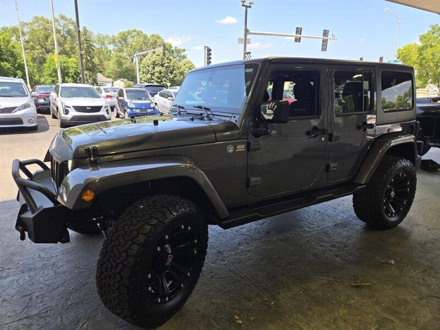 2016 Granite Crystal Metallic Clear Coat Jeep Wrangler Unlimited Sahara (1C4BJWEG3GL) with an 3.6L V6 285hp 260ft. lbs. engine, Automatic transmission, located at 25355 Eames Street, Channahon, IL, 60410, (815) 467-1807, 41.429108, -88.228432 - Introducing the 2016 Jeep Wrangler Unlimited Sahara, a rugged and versatile SUV ready to take on any adventure. Equipped with a powerful 3.6L V6 engine producing 285 horsepower and 260 ft. lbs. of torque, this vehicle offers both performance and capability. Straight from the factory, the 2016 Jeep - Photo#6