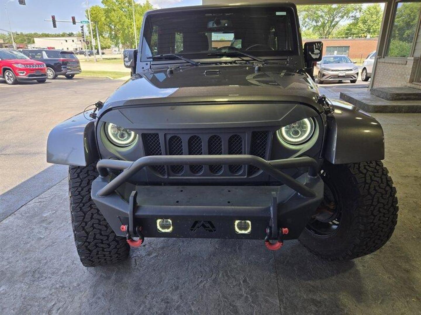 2016 Granite Crystal Metallic Clear Coat Jeep Wrangler Unlimited Sahara (1C4BJWEG3GL) with an 3.6L V6 285hp 260ft. lbs. engine, Automatic transmission, located at 25355 Eames Street, Channahon, IL, 60410, (815) 467-1807, 41.429108, -88.228432 - Introducing the 2016 Jeep Wrangler Unlimited Sahara, a rugged and versatile SUV ready to take on any adventure. Equipped with a powerful 3.6L V6 engine producing 285 horsepower and 260 ft. lbs. of torque, this vehicle offers both performance and capability. Straight from the factory, the 2016 Jeep - Photo#7