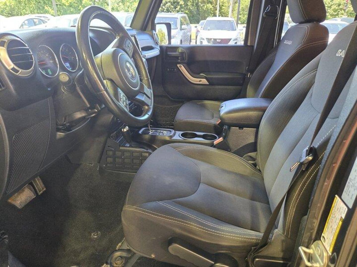 2016 Granite Crystal Metallic Clear Coat Jeep Wrangler Unlimited Sahara (1C4BJWEG3GL) with an 3.6L V6 285hp 260ft. lbs. engine, Automatic transmission, located at 25355 Eames Street, Channahon, IL, 60410, (815) 467-1807, 41.429108, -88.228432 - Introducing the 2016 Jeep Wrangler Unlimited Sahara, a rugged and versatile SUV ready to take on any adventure. Equipped with a powerful 3.6L V6 engine producing 285 horsepower and 260 ft. lbs. of torque, this vehicle offers both performance and capability. Straight from the factory, the 2016 Jeep - Photo#12