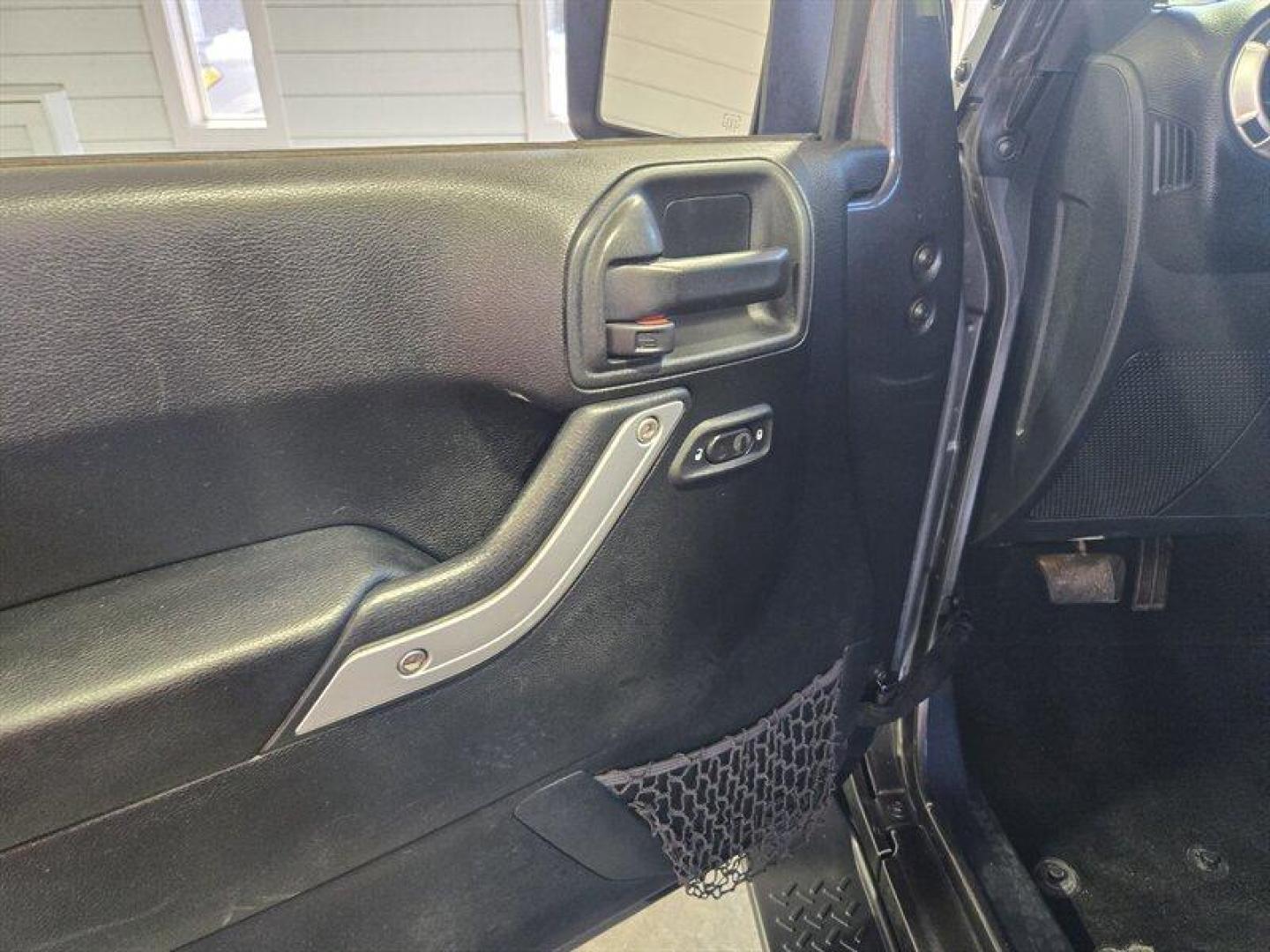 2016 Granite Crystal Metallic Clear Coat Jeep Wrangler Unlimited Sahara (1C4BJWEG3GL) with an 3.6L V6 285hp 260ft. lbs. engine, Automatic transmission, located at 25355 Eames Street, Channahon, IL, 60410, (815) 467-1807, 41.429108, -88.228432 - Introducing the 2016 Jeep Wrangler Unlimited Sahara, a rugged and versatile SUV ready to take on any adventure. Equipped with a powerful 3.6L V6 engine producing 285 horsepower and 260 ft. lbs. of torque, this vehicle offers both performance and capability. Straight from the factory, the 2016 Jeep - Photo#16