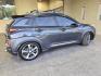2019 Thunder Gray Hyundai KONA Ultimate (KM8K5CA52KU) with an 1.6L Turbo I4 175hp 195ft. lbs. engine, Automatic transmission, located at 25355 Eames Street, Channahon, IL, 60410, (815) 467-1807, 41.429108, -88.228432 - Introducing the powerhouse on wheels - the 2019 Hyundai KONA Ultimate in Thunder Gray! This beast is equipped with a 1.6L Turbocharged Inline-4 engine, pumping out a jaw-dropping 175 horsepower and 195 ft. lbs. of torque. Dominate the roads with this machine! Step inside the lap of luxury with the - Photo#3
