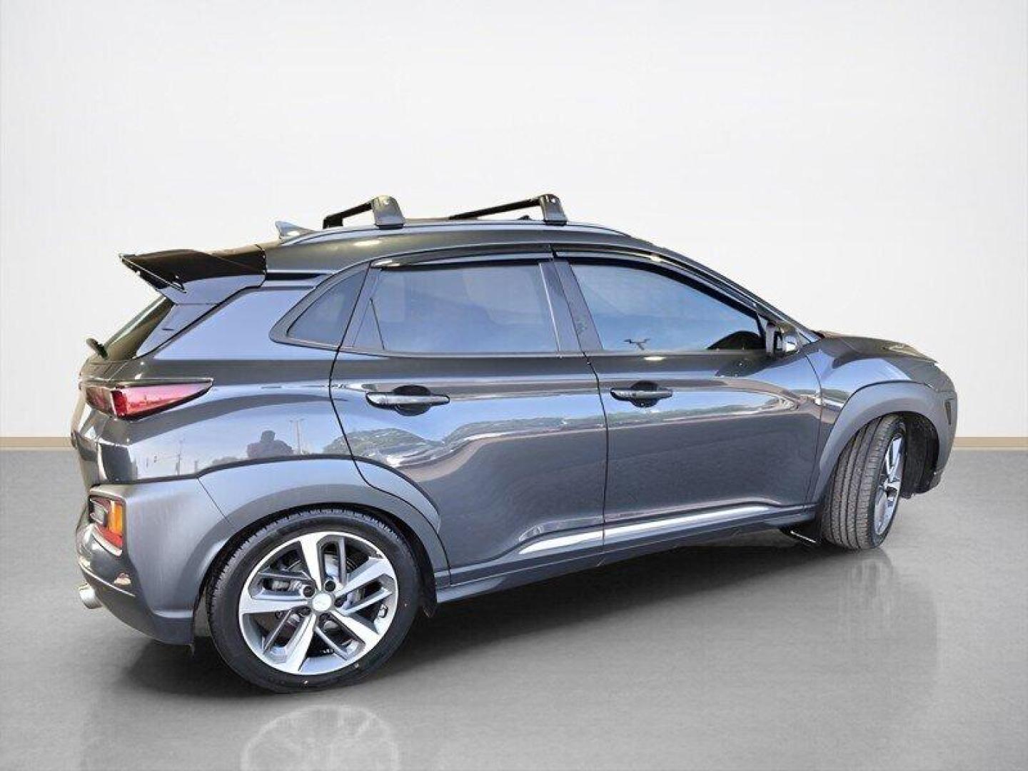 2019 Thunder Gray Hyundai KONA Ultimate (KM8K5CA52KU) with an 1.6L Turbo I4 175hp 195ft. lbs. engine, Automatic transmission, located at 25355 Eames Street, Channahon, IL, 60410, (815) 467-1807, 41.429108, -88.228432 - Introducing the powerhouse on wheels - the 2019 Hyundai KONA Ultimate in Thunder Gray! This beast is equipped with a 1.6L Turbocharged Inline-4 engine, pumping out a jaw-dropping 175 horsepower and 195 ft. lbs. of torque. Dominate the roads with this machine! Step inside the lap of luxury with the - Photo#2