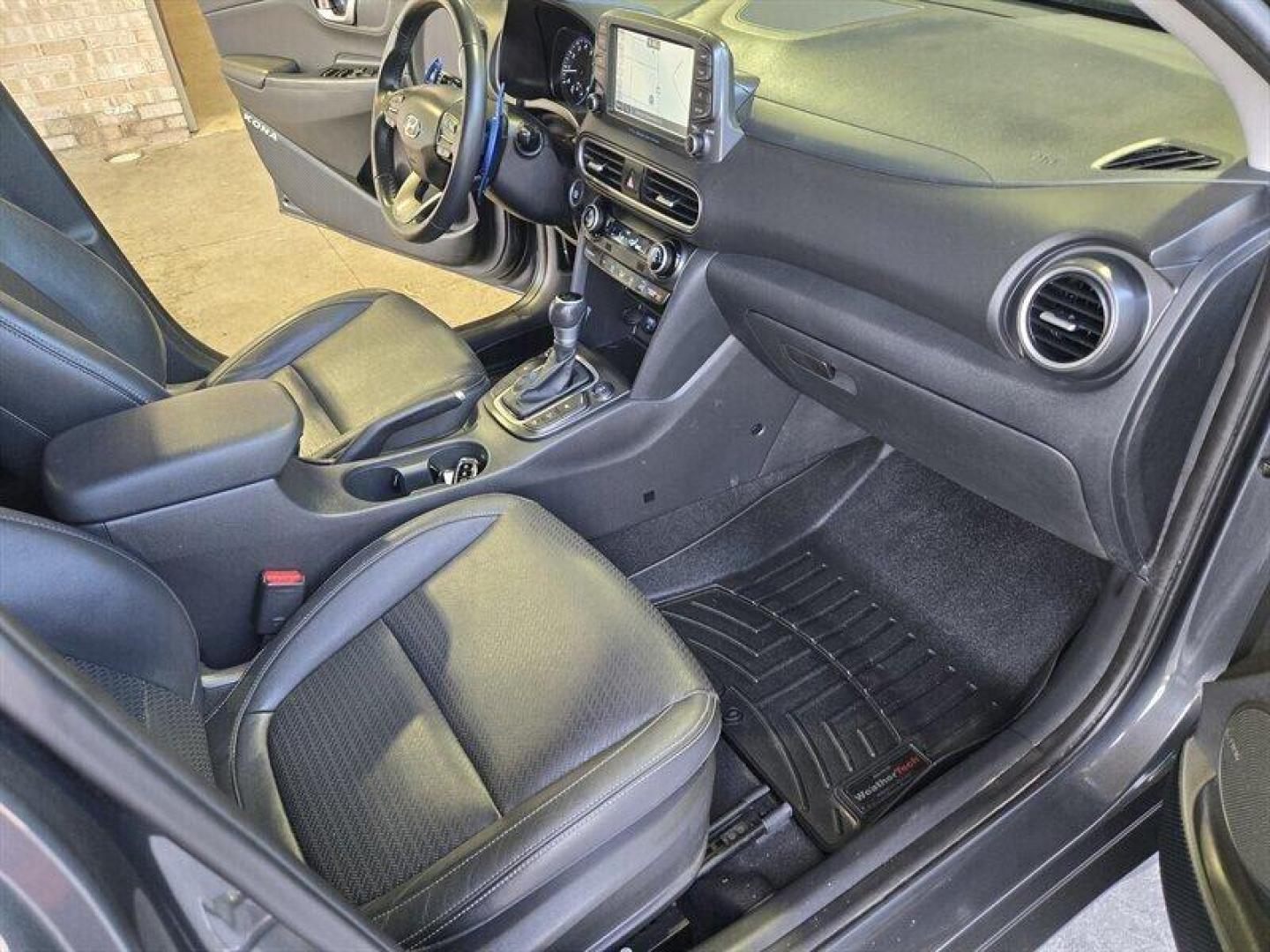 2019 Thunder Gray Hyundai KONA Ultimate (KM8K5CA52KU) with an 1.6L Turbo I4 175hp 195ft. lbs. engine, Automatic transmission, located at 25355 Eames Street, Channahon, IL, 60410, (815) 467-1807, 41.429108, -88.228432 - Introducing the powerhouse on wheels - the 2019 Hyundai KONA Ultimate in Thunder Gray! This beast is equipped with a 1.6L Turbocharged Inline-4 engine, pumping out a jaw-dropping 175 horsepower and 195 ft. lbs. of torque. Dominate the roads with this machine! Step inside the lap of luxury with the - Photo#15