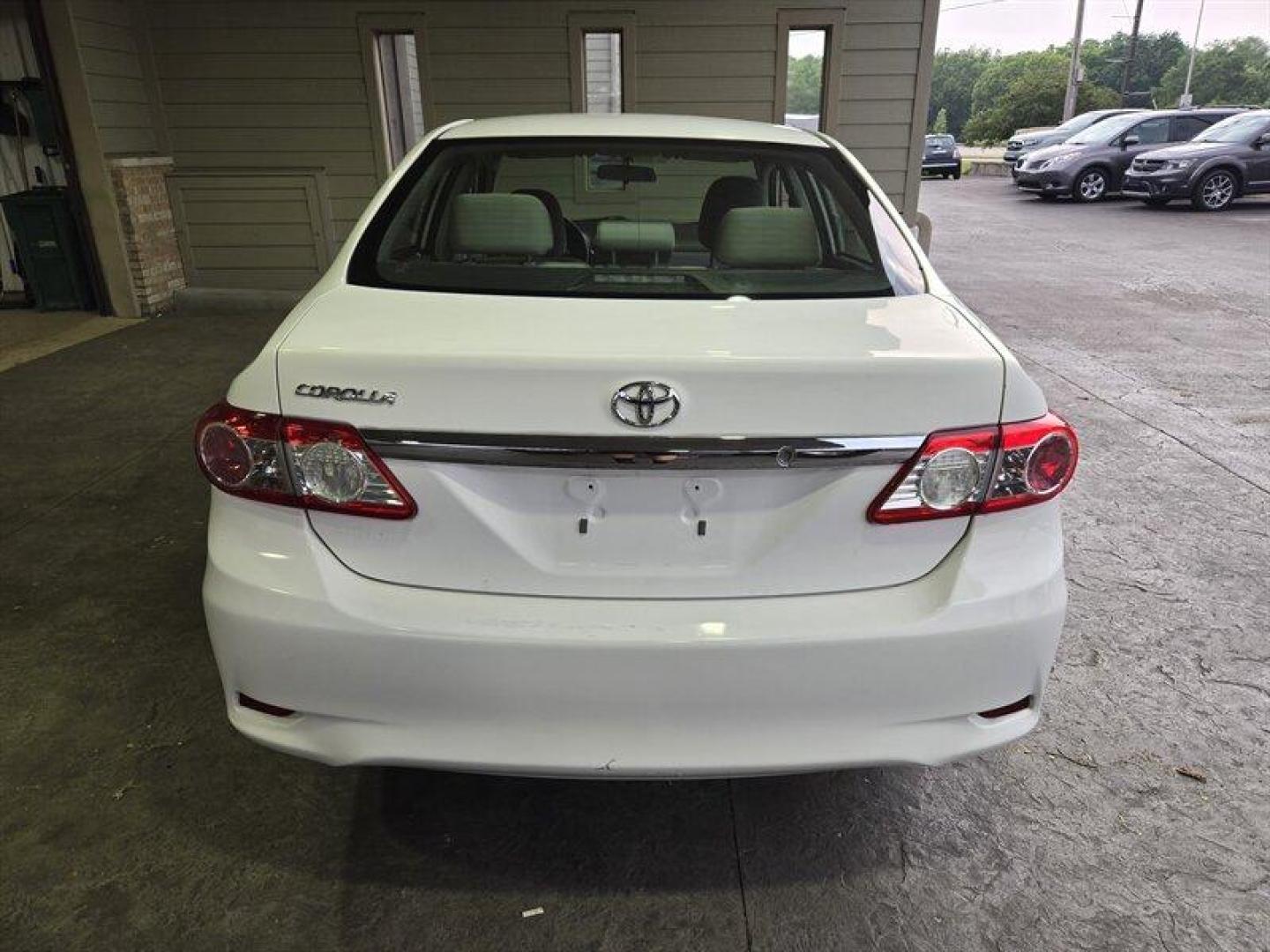 2012 Super White Toyota Corolla L (2T1BU4EE8CC) with an 1.8L I4 132hp 128ft. lbs. engine, Automatic transmission, located at 25355 Eames Street, Channahon, IL, 60410, (815) 467-1807, 41.429108, -88.228432 - ** FLORIDA CAR RUST FREE BUT PAINT IS A CHALKY WHITE. ** This 2012 Toyota Corolla L comes with a reliable 1.8L I4 engine delivering 132hp and 128ft. lbs. of torque. The exterior of this vehicle is finished in a sleek Super White color, complemented by a Black interior. With low mileage of below 60,0 - Photo#5