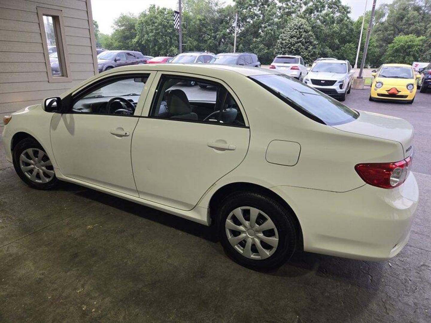 2012 Super White Toyota Corolla L (2T1BU4EE8CC) with an 1.8L I4 132hp 128ft. lbs. engine, Automatic transmission, located at 25355 Eames Street, Channahon, IL, 60410, (815) 467-1807, 41.429108, -88.228432 - ** FLORIDA CAR RUST FREE BUT PAINT IS A CHALKY WHITE. ** This 2012 Toyota Corolla L comes with a reliable 1.8L I4 engine delivering 132hp and 128ft. lbs. of torque. The exterior of this vehicle is finished in a sleek Super White color, complemented by a Black interior. With low mileage of below 60,0 - Photo#6