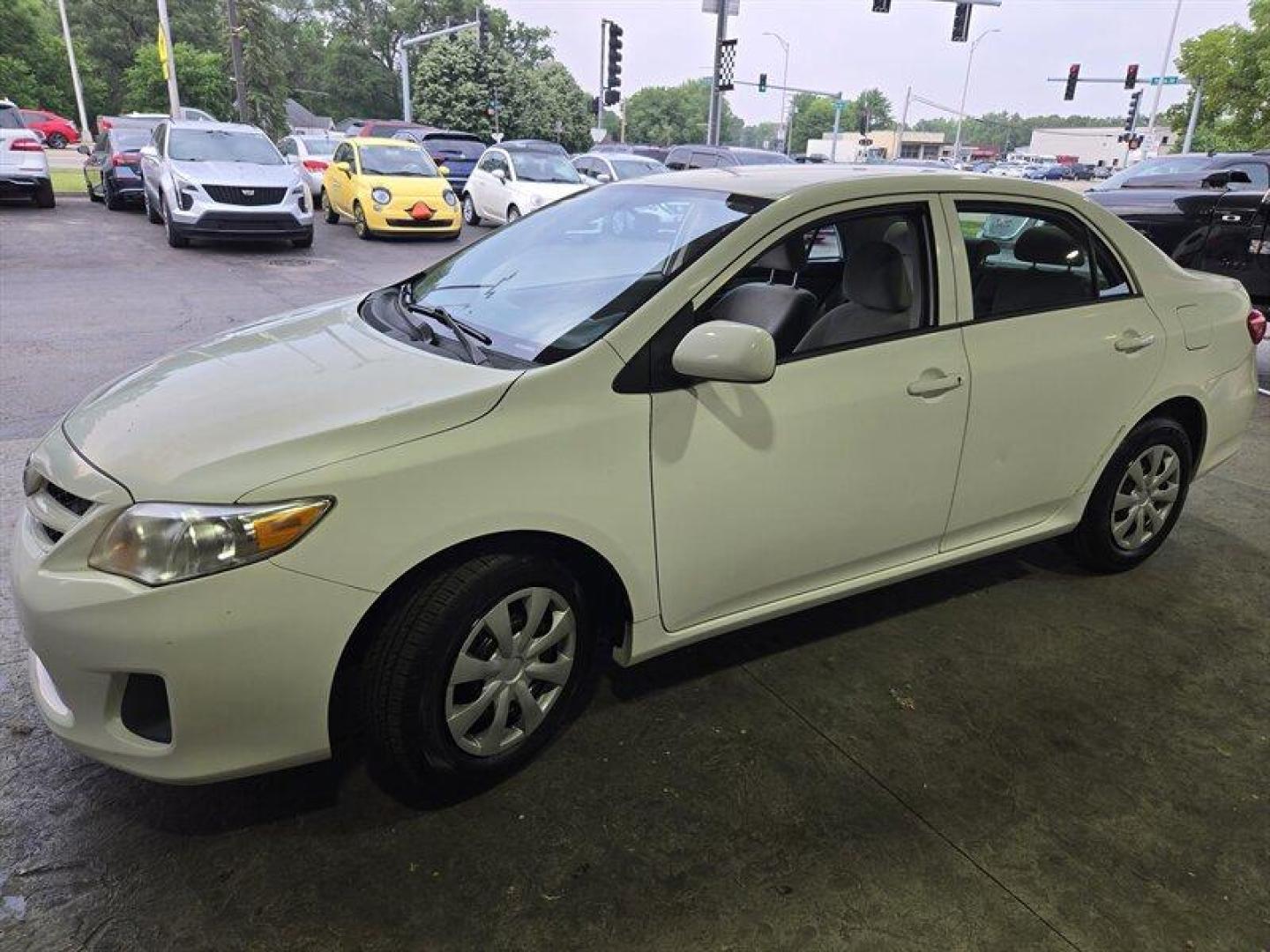 2012 Super White Toyota Corolla L (2T1BU4EE8CC) with an 1.8L I4 132hp 128ft. lbs. engine, Automatic transmission, located at 25355 Eames Street, Channahon, IL, 60410, (815) 467-1807, 41.429108, -88.228432 - ** FLORIDA CAR RUST FREE BUT PAINT IS A CHALKY WHITE. ** This 2012 Toyota Corolla L comes with a reliable 1.8L I4 engine delivering 132hp and 128ft. lbs. of torque. The exterior of this vehicle is finished in a sleek Super White color, complemented by a Black interior. With low mileage of below 60,0 - Photo#8