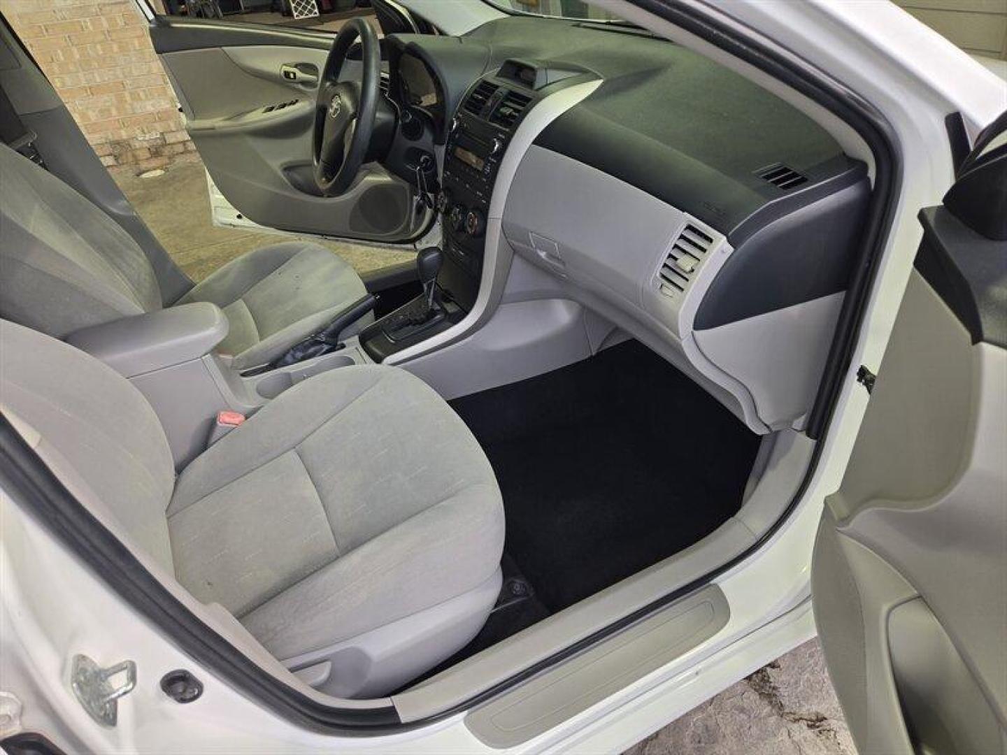 2012 Super White Toyota Corolla L (2T1BU4EE8CC) with an 1.8L I4 132hp 128ft. lbs. engine, Automatic transmission, located at 25355 Eames Street, Channahon, IL, 60410, (815) 467-1807, 41.429108, -88.228432 - ** FLORIDA CAR RUST FREE BUT PAINT IS A CHALKY WHITE. ** This 2012 Toyota Corolla L comes with a reliable 1.8L I4 engine delivering 132hp and 128ft. lbs. of torque. The exterior of this vehicle is finished in a sleek Super White color, complemented by a Black interior. With low mileage of below 60,0 - Photo#14