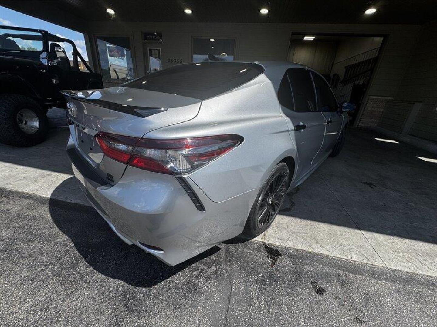 2022 Celestial Silver Metallic Toyota Camry SE (4T1T11BK0NU) with an 2.5L I4 202hp 182ft. lbs. engine, Automatic transmission, located at 25355 Eames Street, Channahon, IL, 60410, (815) 467-1807, 41.429108, -88.228432 - Introducing the 2022 Toyota Camry SE in the stunning Celestial Silver Metallic exterior color with a sleek Black interior! This beauty is powered by a robust 2.5L I4 engine, delivering an impressive 202hp and 182ft. lbs. of torque for a thrilling driving experience. Step inside this Camry SE and yo - Photo#3