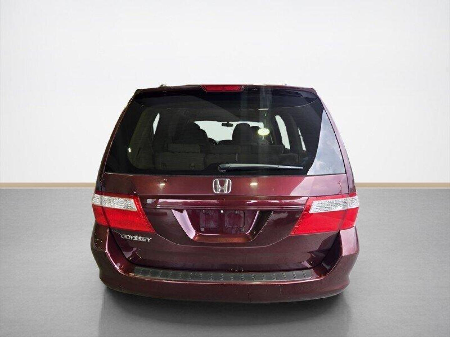 2007 Dark Cherry Pearl Honda Odyssey EX (5FNRL38457B) with an 3.5L V6 244hp 240ft. lbs. engine, Automatic transmission, located at 25355 Eames Street, Channahon, IL, 60410, (815) 467-1807, 41.429108, -88.228432 - Presenting the 2007 Honda Odyssey EX in a sleek Dark Cherry Pearl exterior with a cozy Gray interior. Powered by a robust 3.5L V6 engine producing 244hp and 240ft. lbs. of torque, this minivan offers a perfect blend of power and efficiency. Boasting low mileage at under 104,000 miles, averaging less - Photo#3