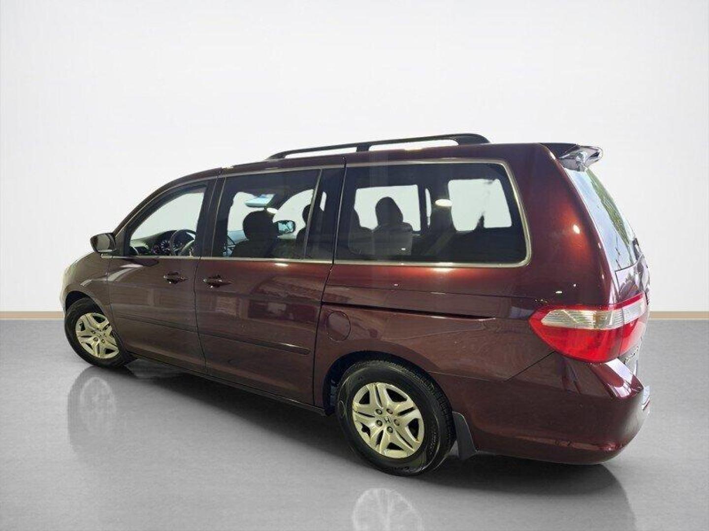 2007 Dark Cherry Pearl Honda Odyssey EX (5FNRL38457B) with an 3.5L V6 244hp 240ft. lbs. engine, Automatic transmission, located at 25355 Eames Street, Channahon, IL, 60410, (815) 467-1807, 41.429108, -88.228432 - Presenting the 2007 Honda Odyssey EX in a sleek Dark Cherry Pearl exterior with a cozy Gray interior. Powered by a robust 3.5L V6 engine producing 244hp and 240ft. lbs. of torque, this minivan offers a perfect blend of power and efficiency. Boasting low mileage at under 104,000 miles, averaging less - Photo#5