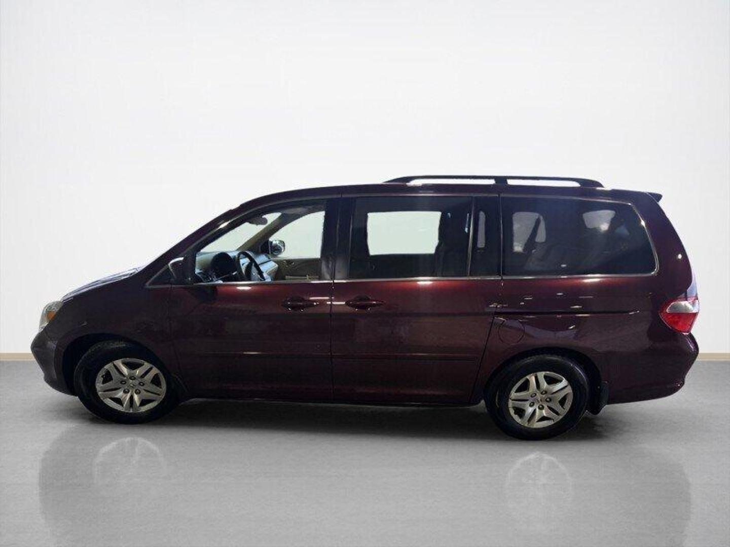 2007 Dark Cherry Pearl Honda Odyssey EX (5FNRL38457B) with an 3.5L V6 244hp 240ft. lbs. engine, Automatic transmission, located at 25355 Eames Street, Channahon, IL, 60410, (815) 467-1807, 41.429108, -88.228432 - Presenting the 2007 Honda Odyssey EX in a sleek Dark Cherry Pearl exterior with a cozy Gray interior. Powered by a robust 3.5L V6 engine producing 244hp and 240ft. lbs. of torque, this minivan offers a perfect blend of power and efficiency. Boasting low mileage at under 104,000 miles, averaging less - Photo#6