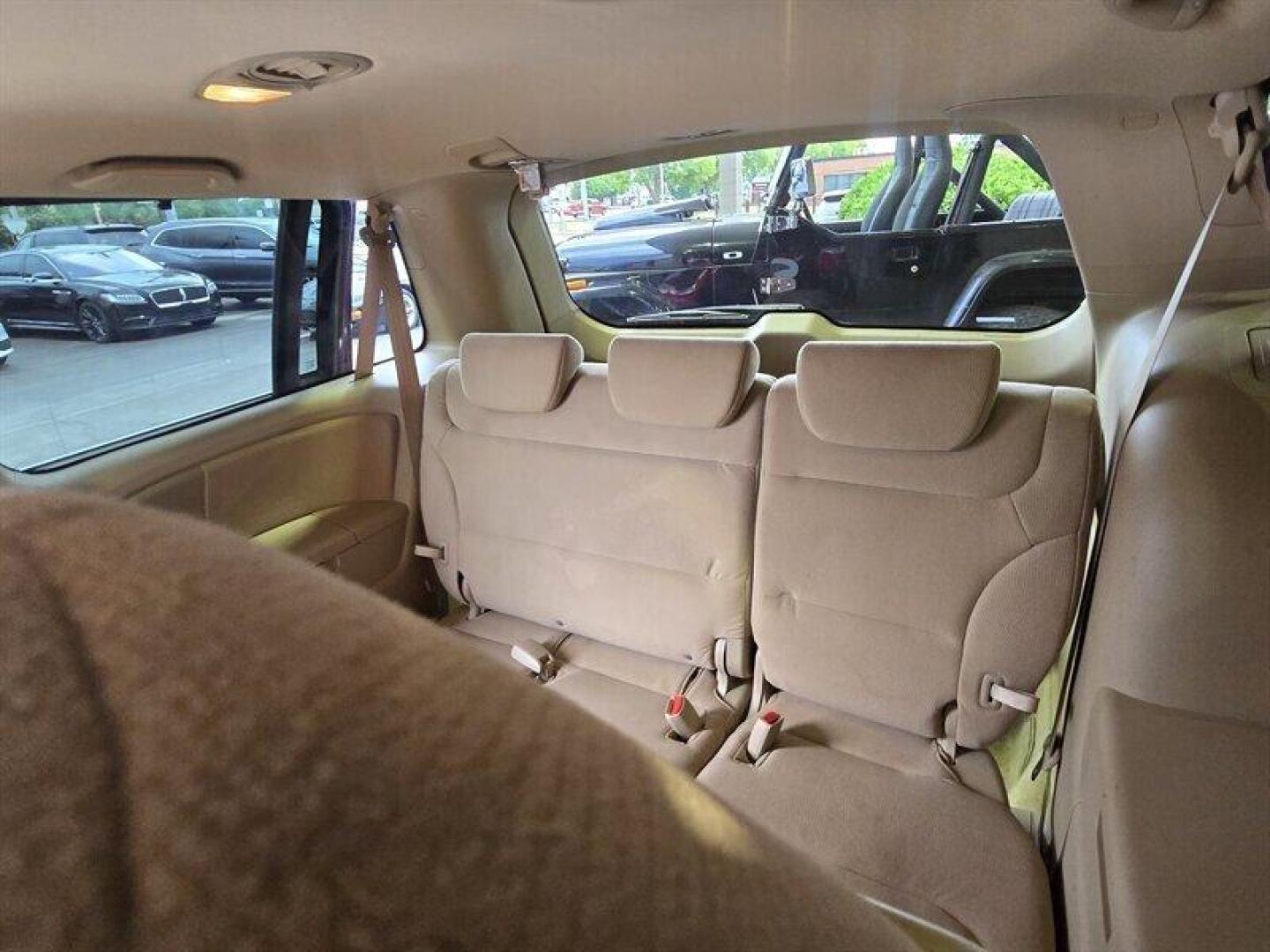 2007 Dark Cherry Pearl Honda Odyssey EX (5FNRL38457B) with an 3.5L V6 244hp 240ft. lbs. engine, Automatic transmission, located at 25355 Eames Street, Channahon, IL, 60410, (815) 467-1807, 41.429108, -88.228432 - Presenting the 2007 Honda Odyssey EX in a sleek Dark Cherry Pearl exterior with a cozy Gray interior. Powered by a robust 3.5L V6 engine producing 244hp and 240ft. lbs. of torque, this minivan offers a perfect blend of power and efficiency. Boasting low mileage at under 104,000 miles, averaging less - Photo#15