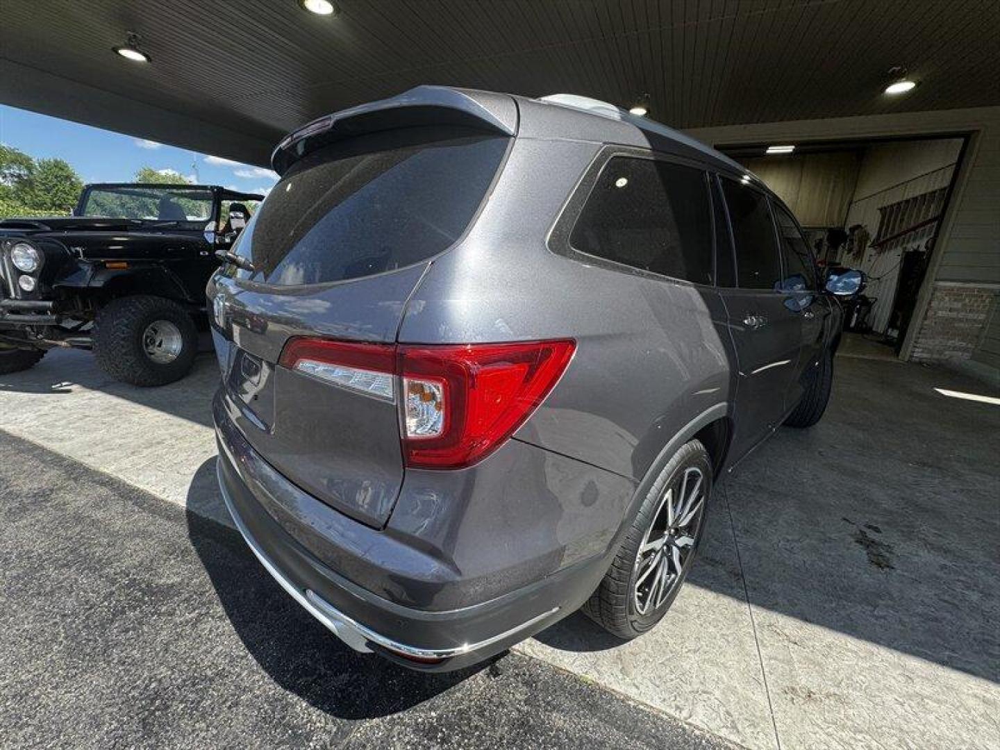 2020 Modern Steel Metallic Honda Pilot Touring 8 Passenger (5FNYF5H97LB) with an 3.5L V6 280hp 262ft. lbs. engine, Automatic transmission, located at 25355 Eames Street, Channahon, IL, 60410, (815) 467-1807, 41.429108, -88.228432 - Behold the 2020 Honda Pilot Touring, a beast on the road with its 3.5L V6 engine packing a punch of 280hp and 262ft. lbs. of torque. This bad boy is coated in a sleek Modern Steel Metallic exterior, exuding confidence wherever it goes. Slip inside to find a sophisticated Gray interior that screams l - Photo#3