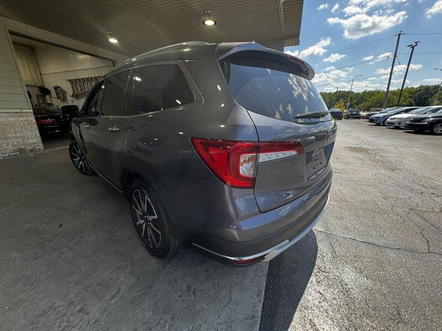 2020 Modern Steel Metallic Honda Pilot Touring 8 Passenger (5FNYF5H97LB) with an 3.5L V6 280hp 262ft. lbs. engine, Automatic transmission, located at 25355 Eames Street, Channahon, IL, 60410, (815) 467-1807, 41.429108, -88.228432 - Behold the 2020 Honda Pilot Touring, a beast on the road with its 3.5L V6 engine packing a punch of 280hp and 262ft. lbs. of torque. This bad boy is coated in a sleek Modern Steel Metallic exterior, exuding confidence wherever it goes. Slip inside to find a sophisticated Gray interior that screams l - Photo#4
