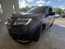 2020 Modern Steel Metallic Honda Pilot Touring 8 Passenger (5FNYF5H97LB) with an 3.5L V6 280hp 262ft. lbs. engine, Automatic transmission, located at 25355 Eames Street, Channahon, IL, 60410, (815) 467-1807, 41.429108, -88.228432 - Behold the 2020 Honda Pilot Touring, a beast on the road with its 3.5L V6 engine packing a punch of 280hp and 262ft. lbs. of torque. This bad boy is coated in a sleek Modern Steel Metallic exterior, exuding confidence wherever it goes. Slip inside to find a sophisticated Gray interior that screams l - Photo#6