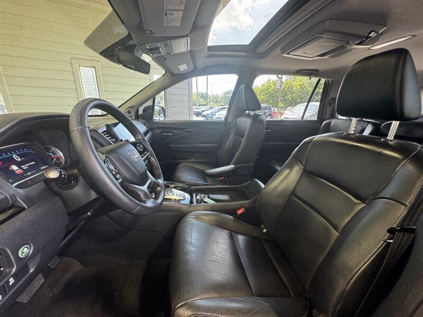 2020 Modern Steel Metallic Honda Pilot Touring 8 Passenger (5FNYF5H97LB) with an 3.5L V6 280hp 262ft. lbs. engine, Automatic transmission, located at 25355 Eames Street, Channahon, IL, 60410, (815) 467-1807, 41.429108, -88.228432 - Behold the 2020 Honda Pilot Touring, a beast on the road with its 3.5L V6 engine packing a punch of 280hp and 262ft. lbs. of torque. This bad boy is coated in a sleek Modern Steel Metallic exterior, exuding confidence wherever it goes. Slip inside to find a sophisticated Gray interior that screams l - Photo#7