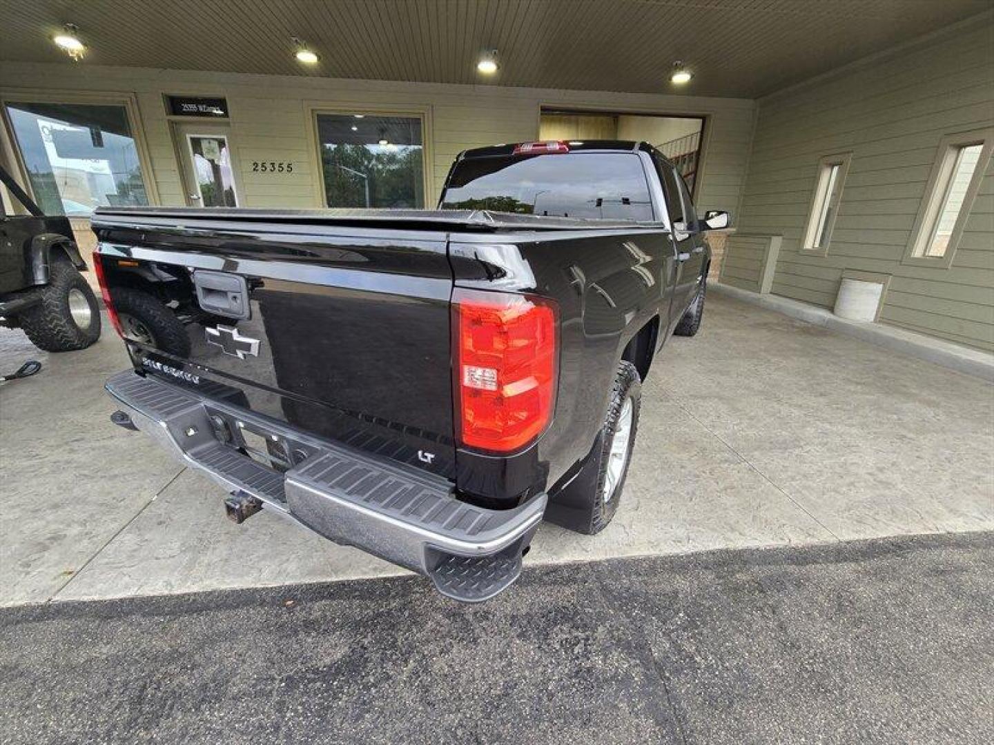 2014 Black Chevrolet Silverado 1500 LT LT2 (3GCUKREC4EG) with an EcoTec3 5.3L Flex Fuel V8 355hp 383ft. lbs. engine, Automatic transmission, located at 25355 Eames Street, Channahon, IL, 60410, (815) 467-1807, 41.429108, -88.228432 - This 2014 Chevrolet Silverado 1500 LT comes equipped with a powerful EcoTec3 5.3L Flex Fuel V8 engine, delivering 355 horsepower and 383 lb-ft of torque. The exterior is finished in a sleek Black color, complemented by a stylish Jet Black interior. This truck is in excellent overall condition, ready - Photo#4