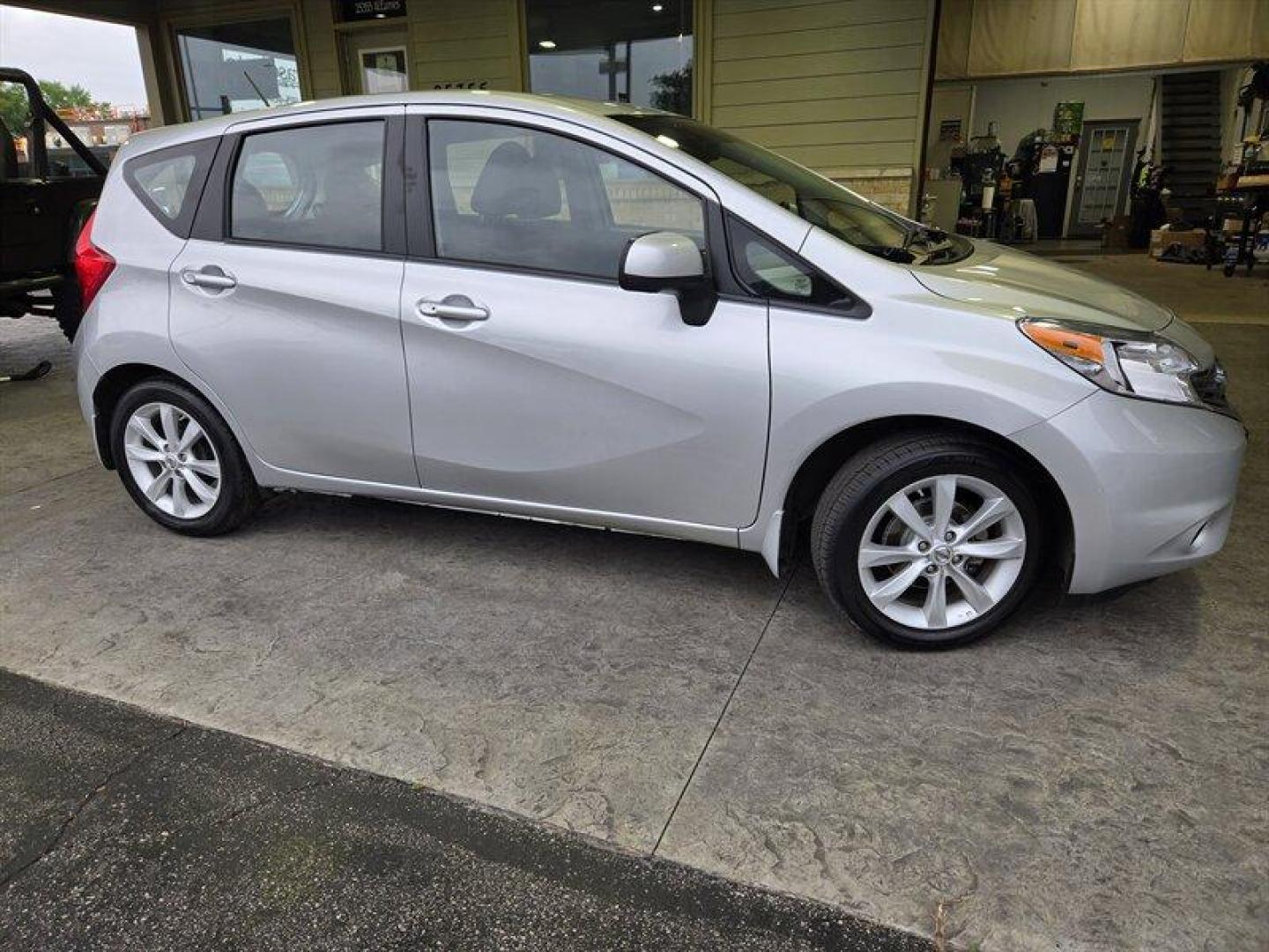 2014 Silver Nissan Versa Note SV (3N1CE2CP5EL) with an 1.6L I4 109hp 107ft. lbs. engine, Automatic transmission, located at 25355 Eames Street, Channahon, IL, 60410, (815) 467-1807, 41.429108, -88.228432 - Looking for a sassy little ride that's big on style and savings? Check out this 2014 Nissan Versa Note SL with a peppy 1.6L I4 engine that's ready to zip through traffic like a boss. With only 18,000 miles on the odometer (that's less than 2,000 miles per year, honey!), this baby is practically bran - Photo#1
