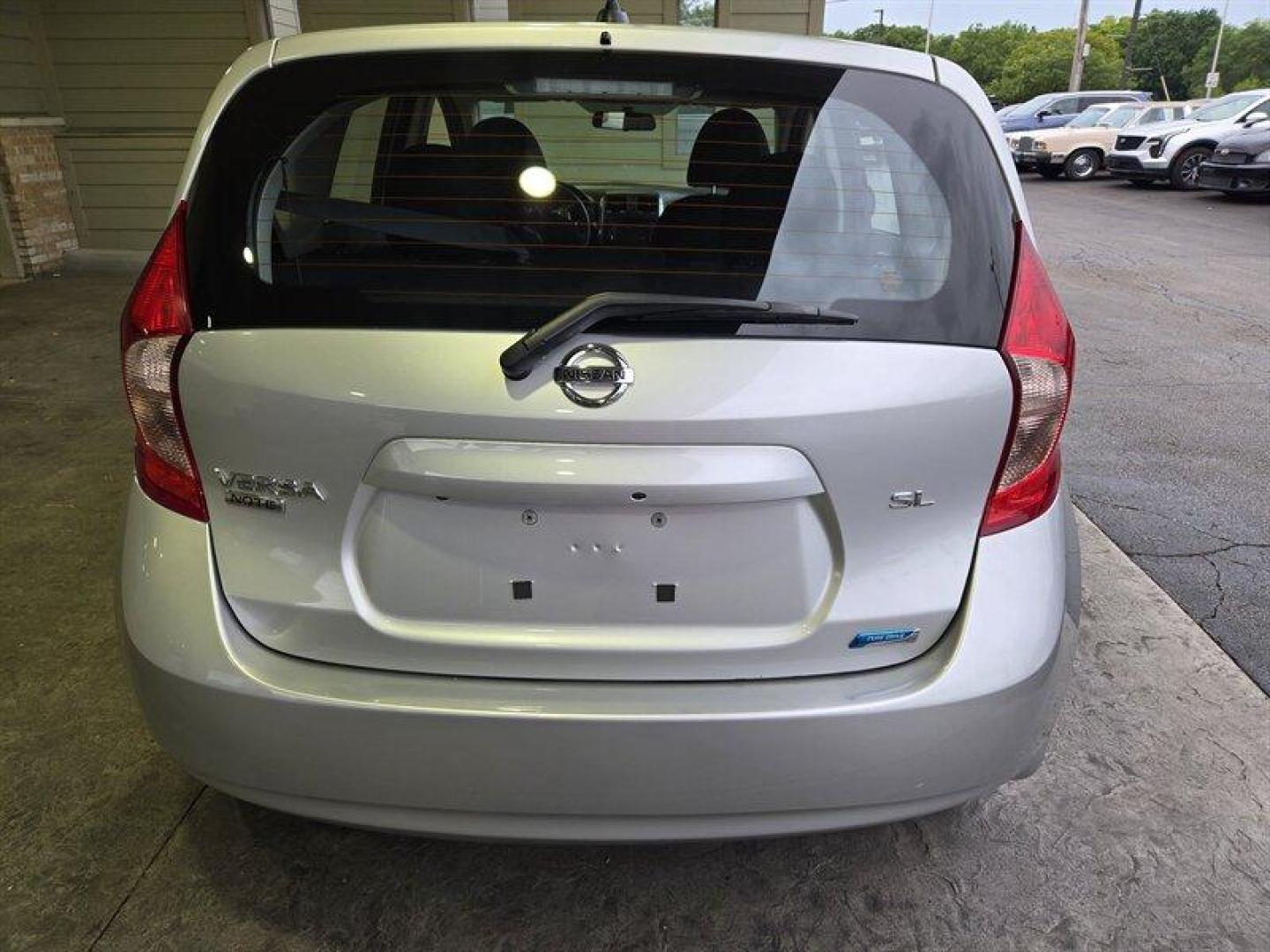 2014 Silver Nissan Versa Note SV (3N1CE2CP5EL) with an 1.6L I4 109hp 107ft. lbs. engine, Automatic transmission, located at 25355 Eames Street, Channahon, IL, 60410, (815) 467-1807, 41.429108, -88.228432 - Looking for a sassy little ride that's big on style and savings? Check out this 2014 Nissan Versa Note SL with a peppy 1.6L I4 engine that's ready to zip through traffic like a boss. With only 18,000 miles on the odometer (that's less than 2,000 miles per year, honey!), this baby is practically bran - Photo#4