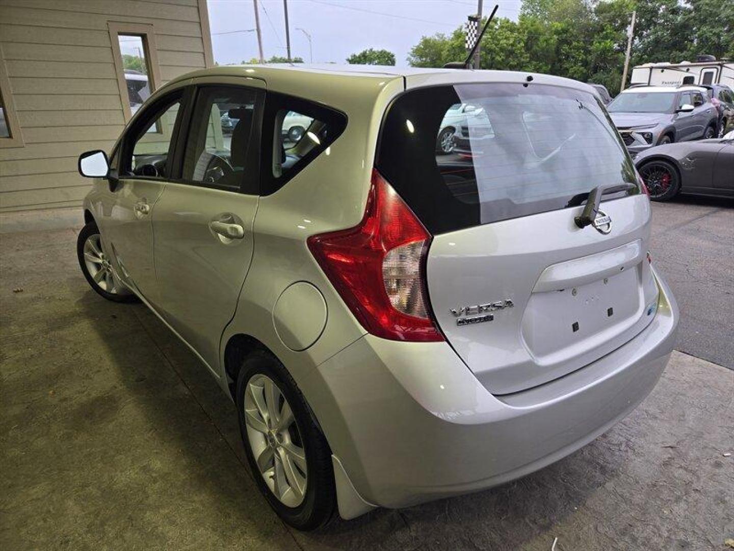 2014 Silver Nissan Versa Note SV (3N1CE2CP5EL) with an 1.6L I4 109hp 107ft. lbs. engine, Automatic transmission, located at 25355 Eames Street, Channahon, IL, 60410, (815) 467-1807, 41.429108, -88.228432 - Looking for a sassy little ride that's big on style and savings? Check out this 2014 Nissan Versa Note SL with a peppy 1.6L I4 engine that's ready to zip through traffic like a boss. With only 18,000 miles on the odometer (that's less than 2,000 miles per year, honey!), this baby is practically bran - Photo#5