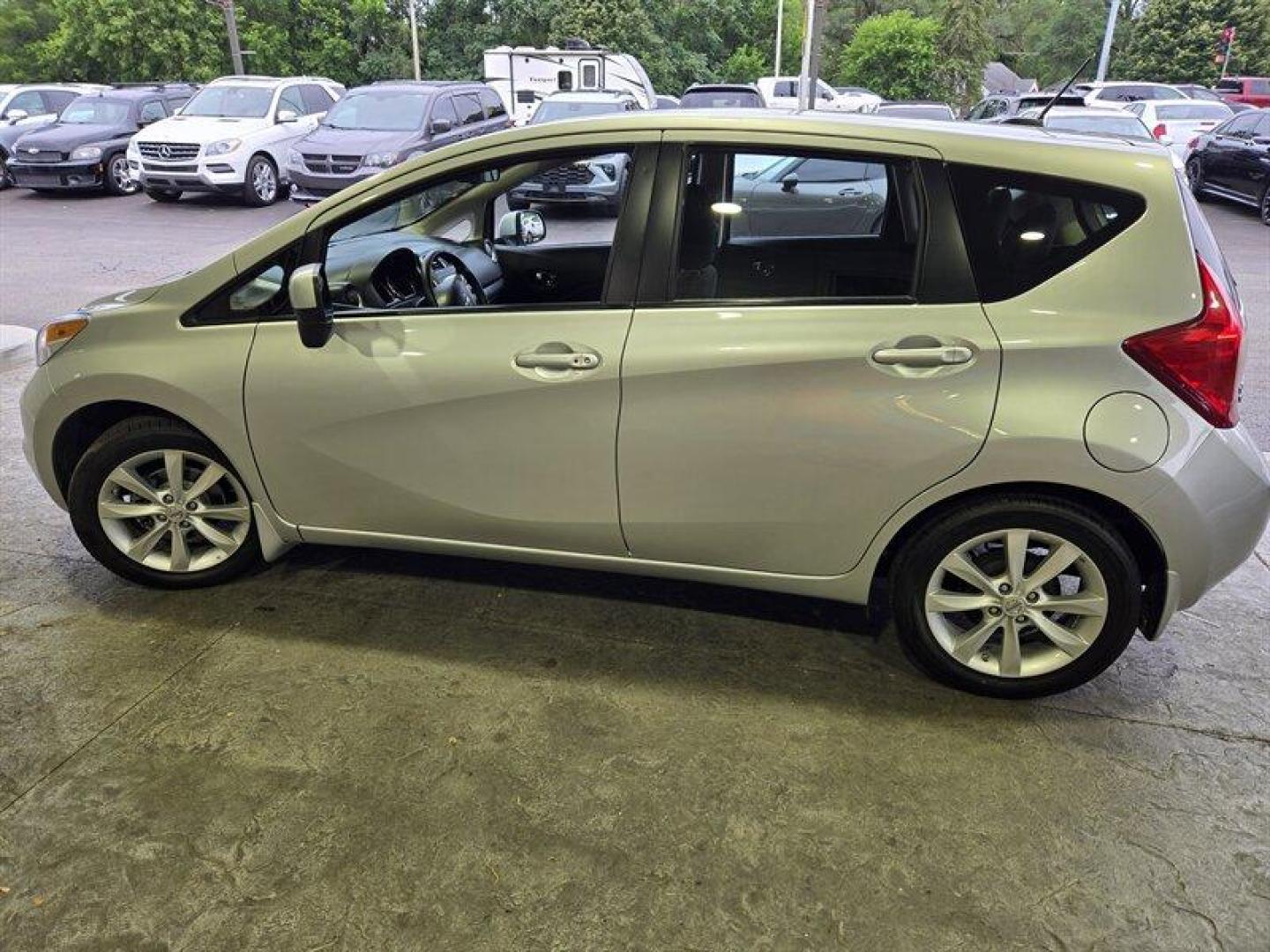 2014 Silver Nissan Versa Note SV (3N1CE2CP5EL) with an 1.6L I4 109hp 107ft. lbs. engine, Automatic transmission, located at 25355 Eames Street, Channahon, IL, 60410, (815) 467-1807, 41.429108, -88.228432 - Looking for a sassy little ride that's big on style and savings? Check out this 2014 Nissan Versa Note SL with a peppy 1.6L I4 engine that's ready to zip through traffic like a boss. With only 18,000 miles on the odometer (that's less than 2,000 miles per year, honey!), this baby is practically bran - Photo#6