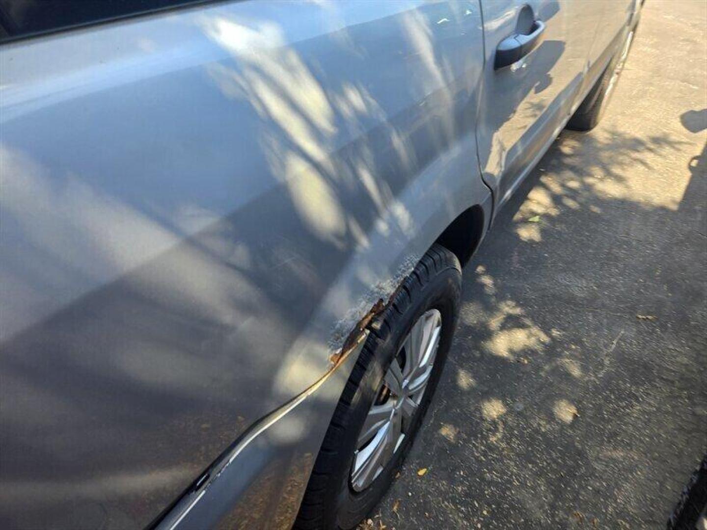 2004 Starlight Silver Metallic Honda Pilot LX (2HKYF18194H) with an 3L NA V6 single overhead cam (SOHC) 24V engine, Automatic transmission, located at 25355 Eames Street, Channahon, IL, 60410, (815) 467-1807, 41.429108, -88.228432 - ** LOCAL TRADE IN, WHOLESALE PRICING, HAS SOME DAMAGE AND RUST, ALSO HAS ABS LIGHT ON. ** This 2004 Honda Pilot LX is equipped with a reliable 3L NA V6 single overhead cam (SOHC) 24V engine, delivering a balanced mix of power and efficiency. The factory default features include a spacious and comfor - Photo#4