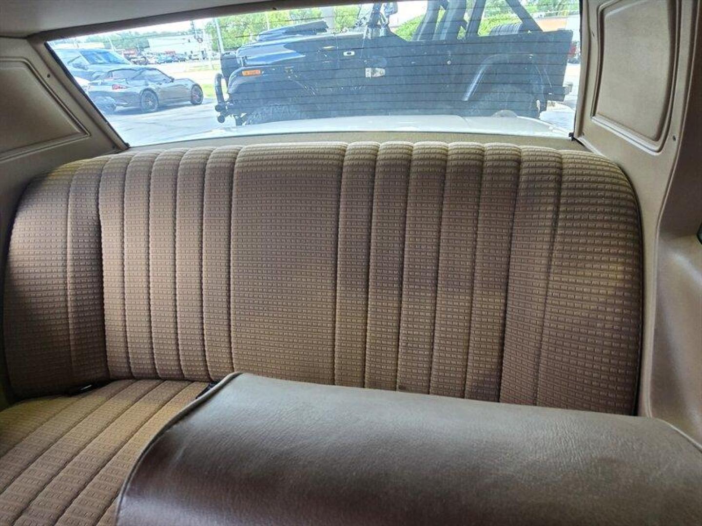 1981 Tan Ford Grenada (1FABP26D3BG) with an 4.2 engine, located at 25355 Eames Street, Channahon, IL, 60410, (815) 467-1807, 41.429108, -88.228432 - Step back in time with this vintage 1981 Ford Grenada! Powered by a trusty 4.2-liter engine, this beauty is a blast from the past with features straight out of the factory. Picture yourself cruising down the road in style with its classic design and retro vibes. Now, let's talk about the factory de - Photo#16