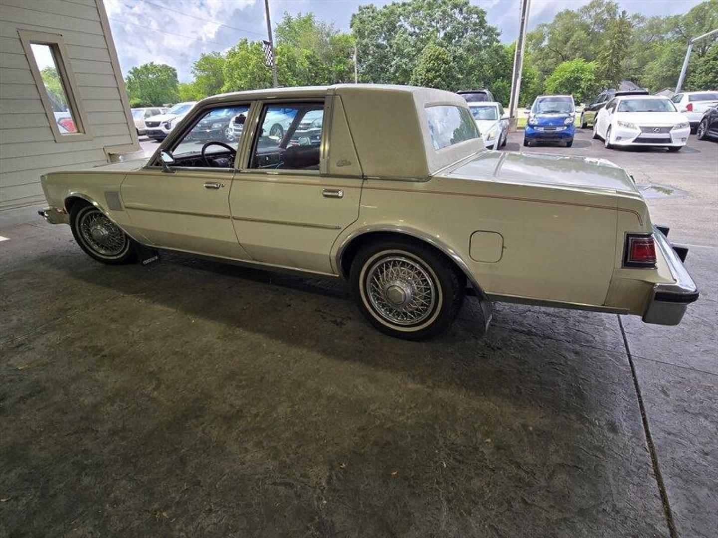 1984 White Chrysler Fifth Avenue (1C3BF66P0EX) with an 5.2L V8 130hp 235ft. lbs. engine, Automatic transmission, located at 25355 Eames Street, Channahon, IL, 60410, (815) 467-1807, 41.429108, -88.228432 - Step back in time with this vintage 1984 Chrysler Fifth Avenue that's as sassy as they come! Powered by a 5.2L V8 engine pumping out 130hp and 235ft. lbs. of torque, this classic beauty is ready to hit the streets with style. Decked out in a sleek White exterior and a bold Red interior, this Fifth - Photo#12