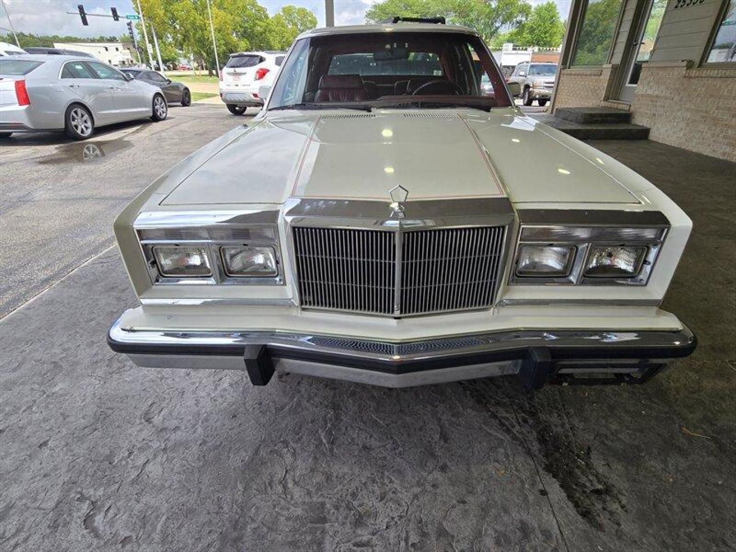 1984 White Chrysler Fifth Avenue (1C3BF66P0EX) with an 5.2L V8 130hp 235ft. lbs. engine, Automatic transmission, located at 25355 Eames Street, Channahon, IL, 60410, (815) 467-1807, 41.429108, -88.228432 - Step back in time with this vintage 1984 Chrysler Fifth Avenue that's as sassy as they come! Powered by a 5.2L V8 engine pumping out 130hp and 235ft. lbs. of torque, this classic beauty is ready to hit the streets with style. Decked out in a sleek White exterior and a bold Red interior, this Fifth - Photo#17