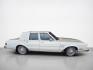 1984 White Chrysler Fifth Avenue (1C3BF66P0EX) with an 5.2L V8 130hp 235ft. lbs. engine, Automatic transmission, located at 25355 Eames Street, Channahon, IL, 60410, (815) 467-1807, 41.429108, -88.228432 - Step back in time with this vintage 1984 Chrysler Fifth Avenue that's as sassy as they come! Powered by a 5.2L V8 engine pumping out 130hp and 235ft. lbs. of torque, this classic beauty is ready to hit the streets with style. Decked out in a sleek White exterior and a bold Red interior, this Fifth - Photo#2