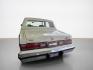 1984 White Chrysler Fifth Avenue (1C3BF66P0EX) with an 5.2L V8 130hp 235ft. lbs. engine, Automatic transmission, located at 25355 Eames Street, Channahon, IL, 60410, (815) 467-1807, 41.429108, -88.228432 - Step back in time with this vintage 1984 Chrysler Fifth Avenue that's as sassy as they come! Powered by a 5.2L V8 engine pumping out 130hp and 235ft. lbs. of torque, this classic beauty is ready to hit the streets with style. Decked out in a sleek White exterior and a bold Red interior, this Fifth - Photo#6