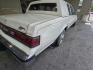 1984 White Chrysler Fifth Avenue (1C3BF66P0EX) with an 5.2L V8 130hp 235ft. lbs. engine, Automatic transmission, located at 25355 Eames Street, Channahon, IL, 60410, (815) 467-1807, 41.429108, -88.228432 - Step back in time with this vintage 1984 Chrysler Fifth Avenue that's as sassy as they come! Powered by a 5.2L V8 engine pumping out 130hp and 235ft. lbs. of torque, this classic beauty is ready to hit the streets with style. Decked out in a sleek White exterior and a bold Red interior, this Fifth - Photo#8