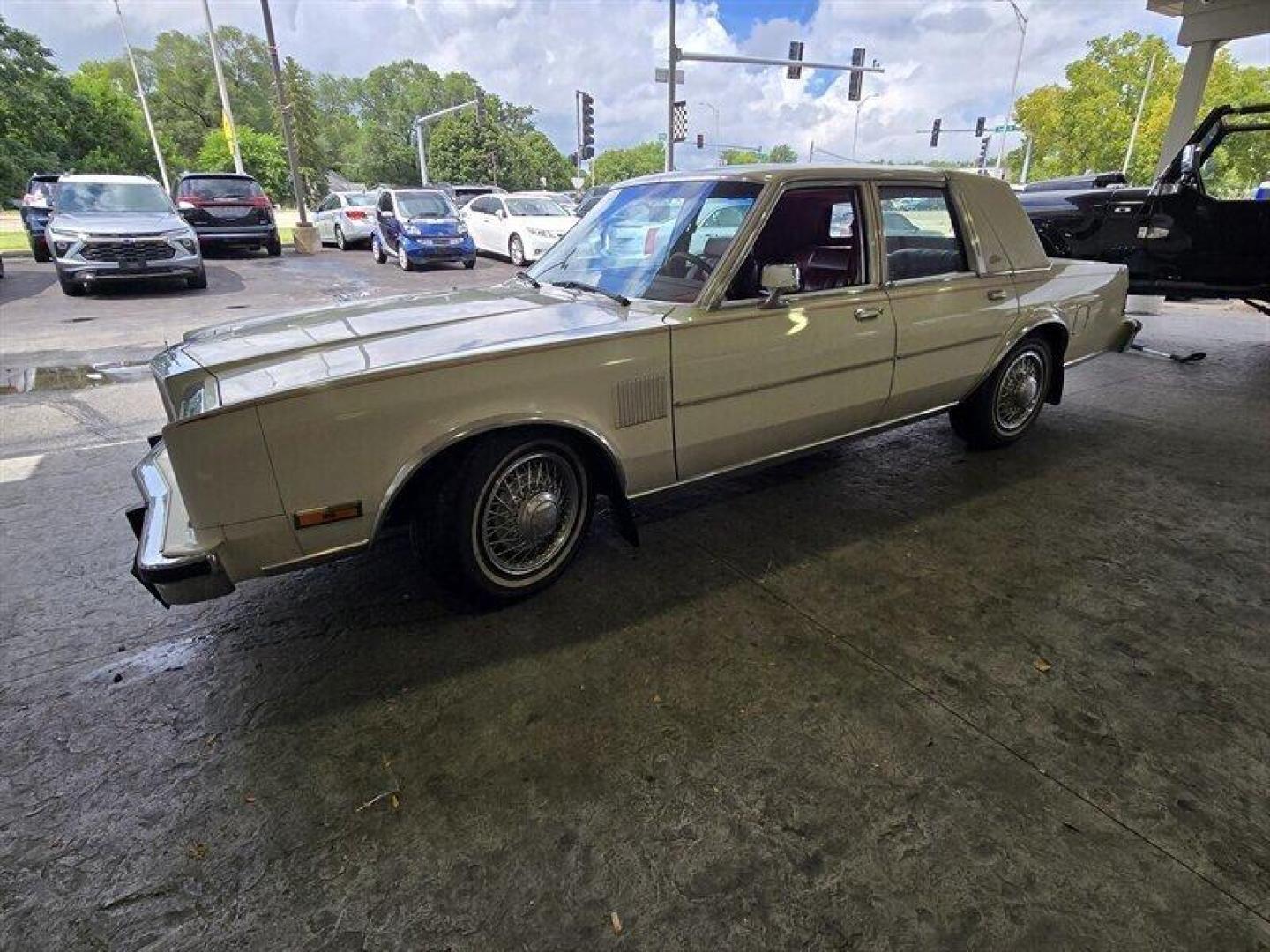 1984 White Chrysler Fifth Avenue (1C3BF66P0EX) with an 5.2L V8 130hp 235ft. lbs. engine, Automatic transmission, located at 25355 Eames Street, Channahon, IL, 60410, (815) 467-1807, 41.429108, -88.228432 - Step back in time with this vintage 1984 Chrysler Fifth Avenue that's as sassy as they come! Powered by a 5.2L V8 engine pumping out 130hp and 235ft. lbs. of torque, this classic beauty is ready to hit the streets with style. Decked out in a sleek White exterior and a bold Red interior, this Fifth - Photo#15